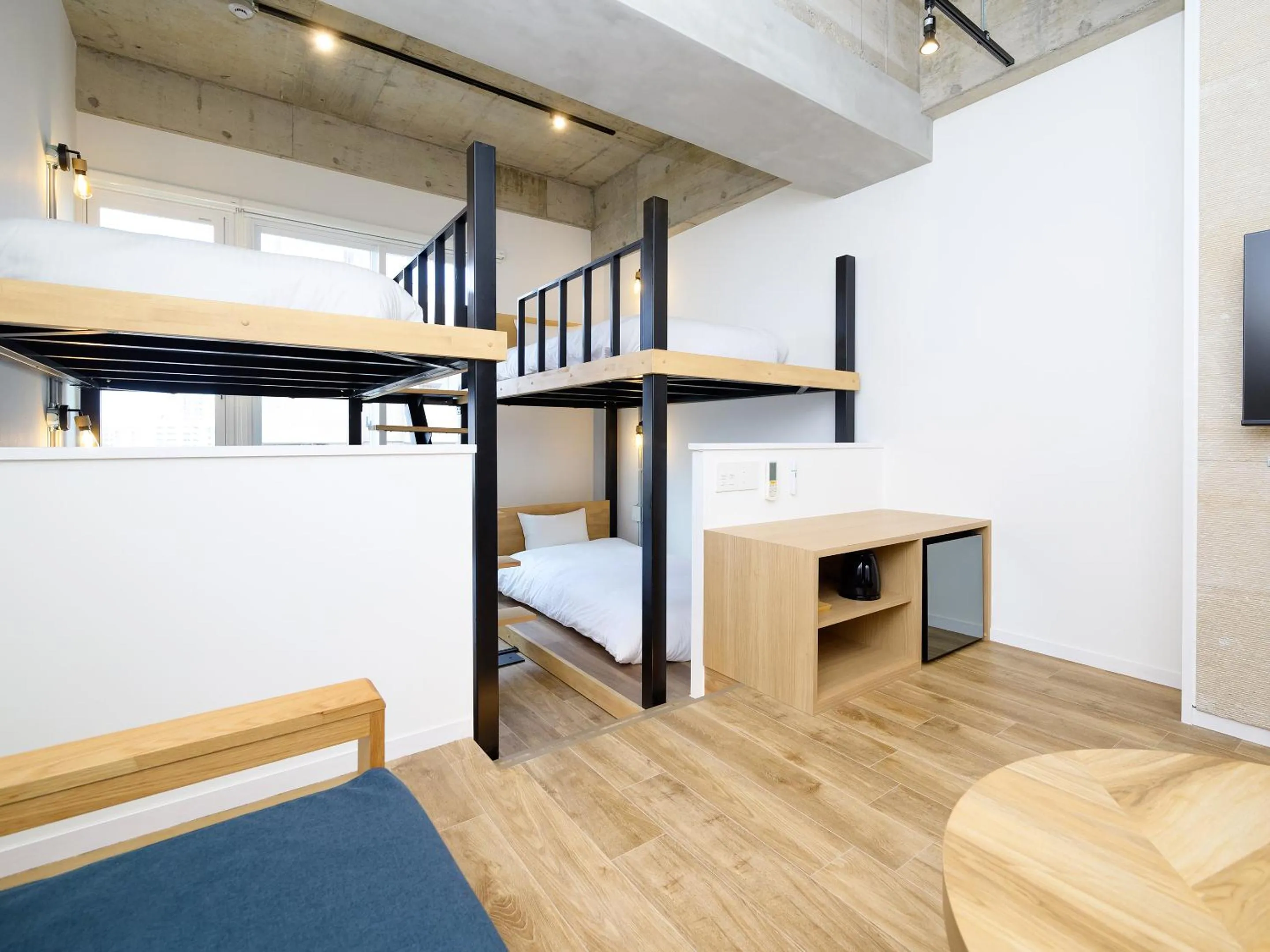 Photo of the whole room, Bed in HOTEL THE CUBE Naha Kokusai Street