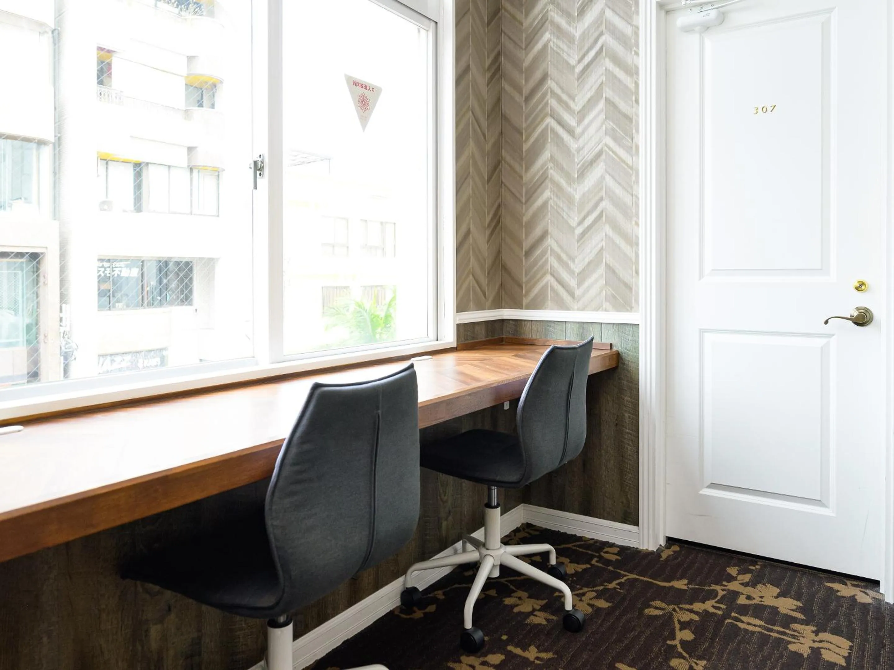 Communal lounge/ TV room in HOTEL THE CUBE Naha Kokusai Street