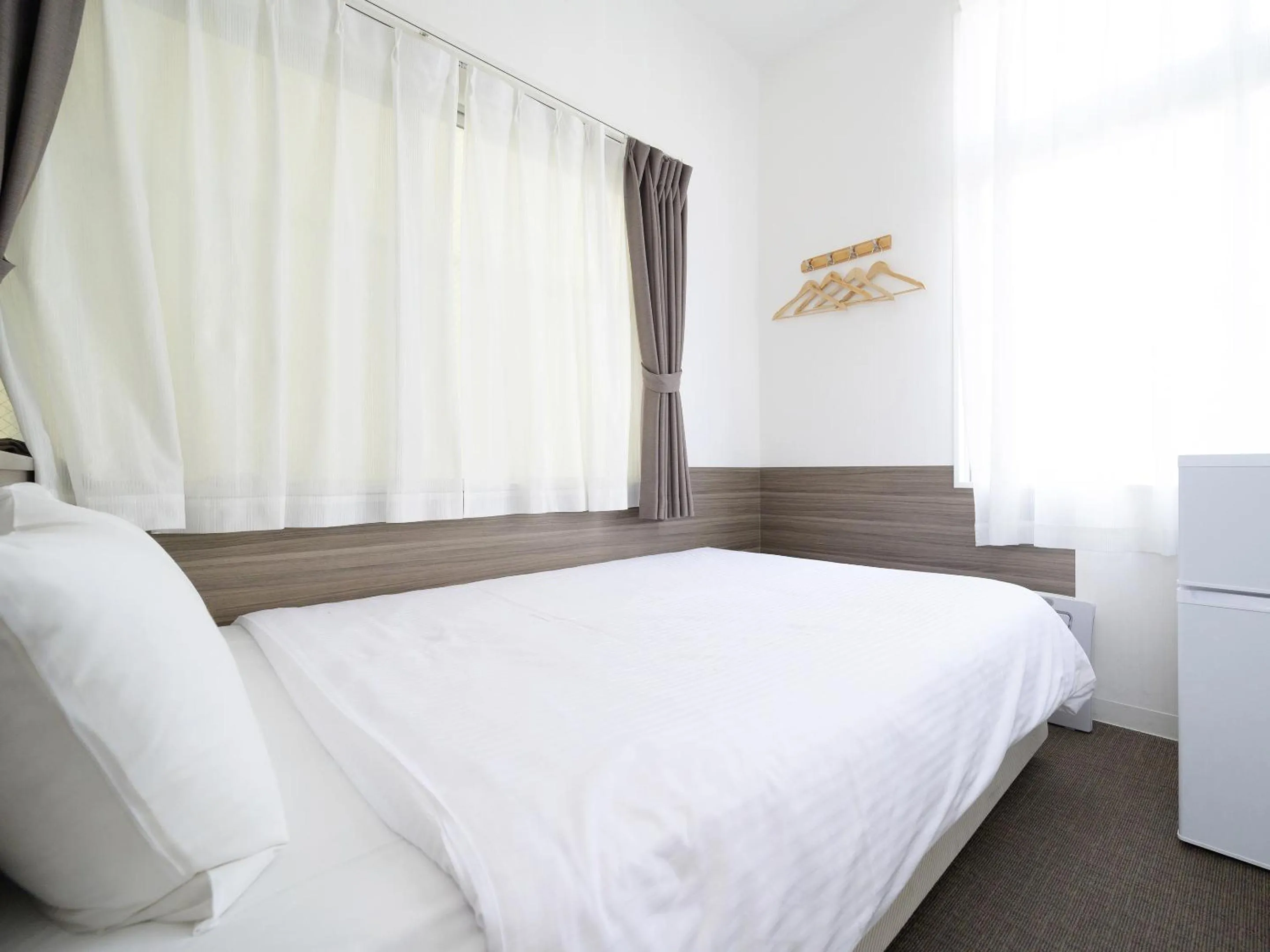 Bed in HOTEL THE CUBE Naha Kokusai Street