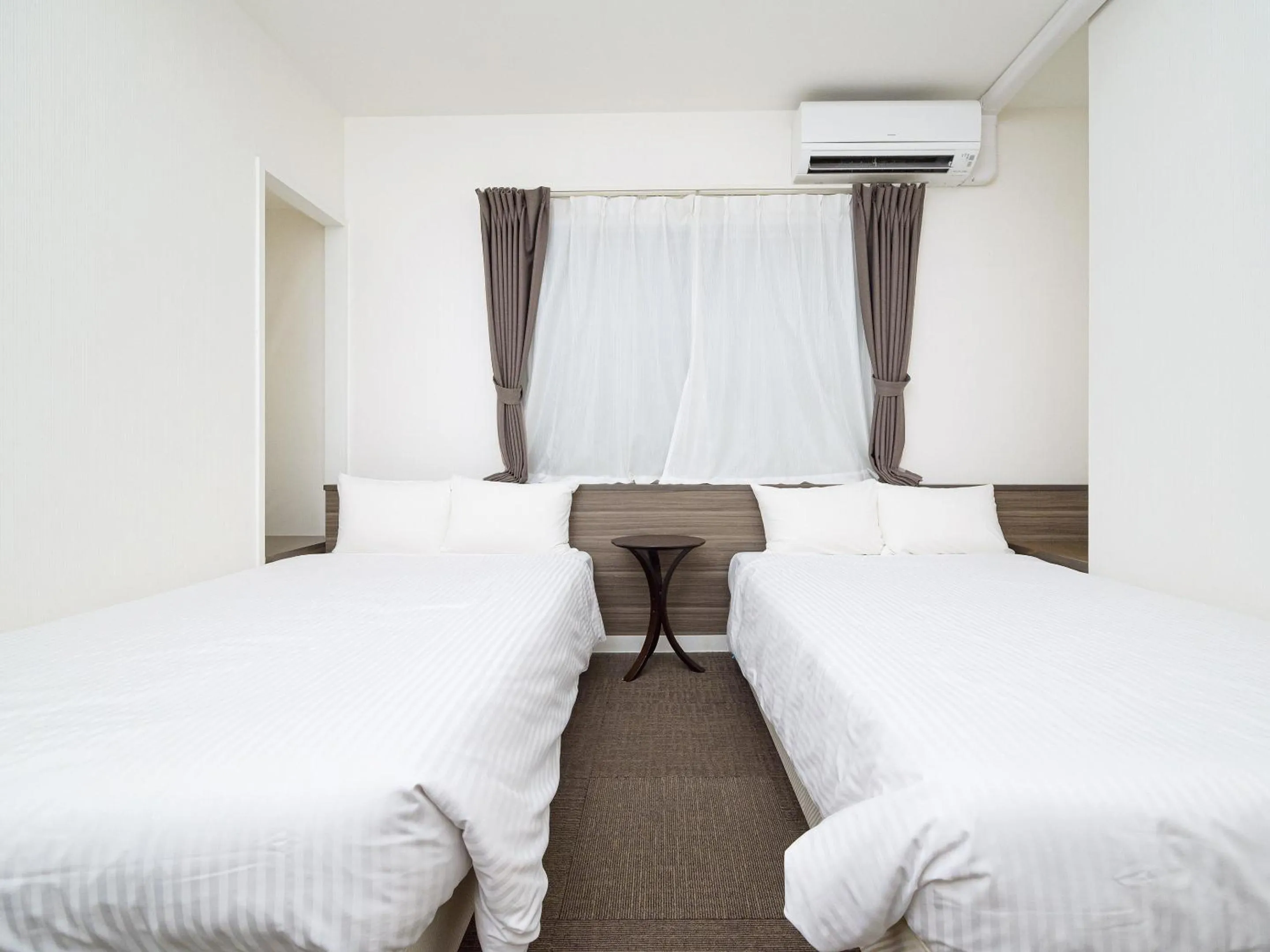 Bed in HOTEL THE CUBE Naha Kokusai Street