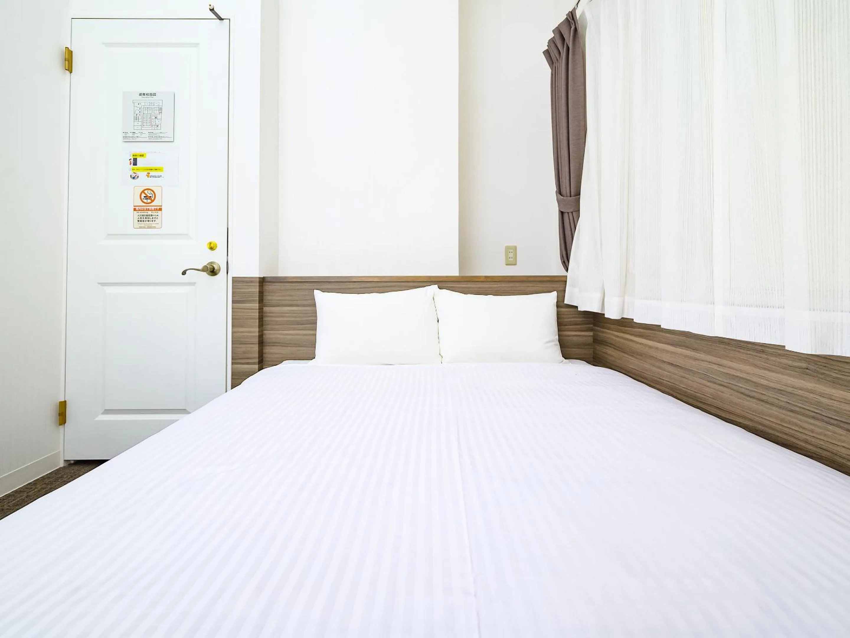 Bed in HOTEL THE CUBE Naha Kokusai Street