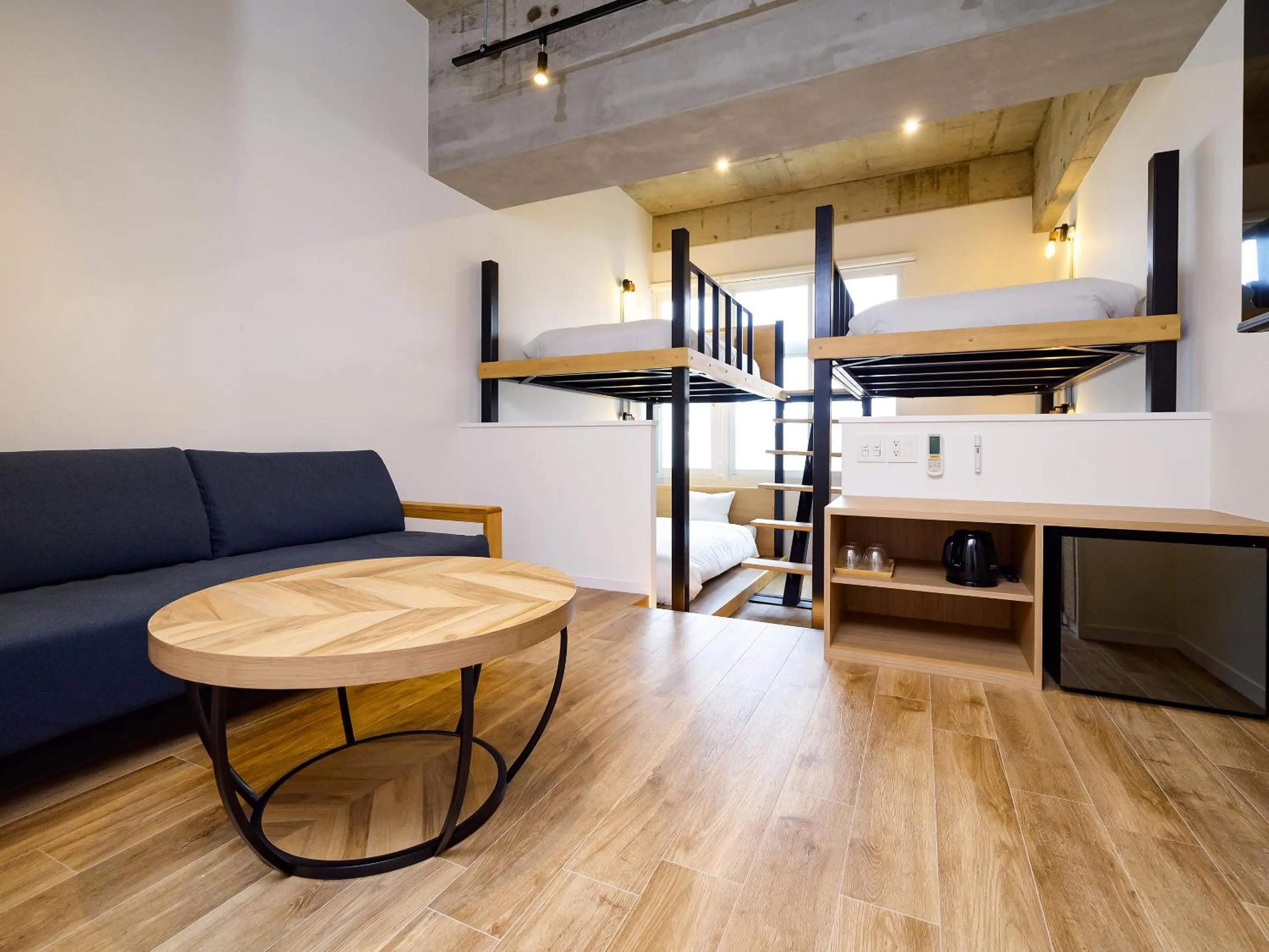 Photo of the whole room, Bed in HOTEL THE CUBE Naha Kokusai Street