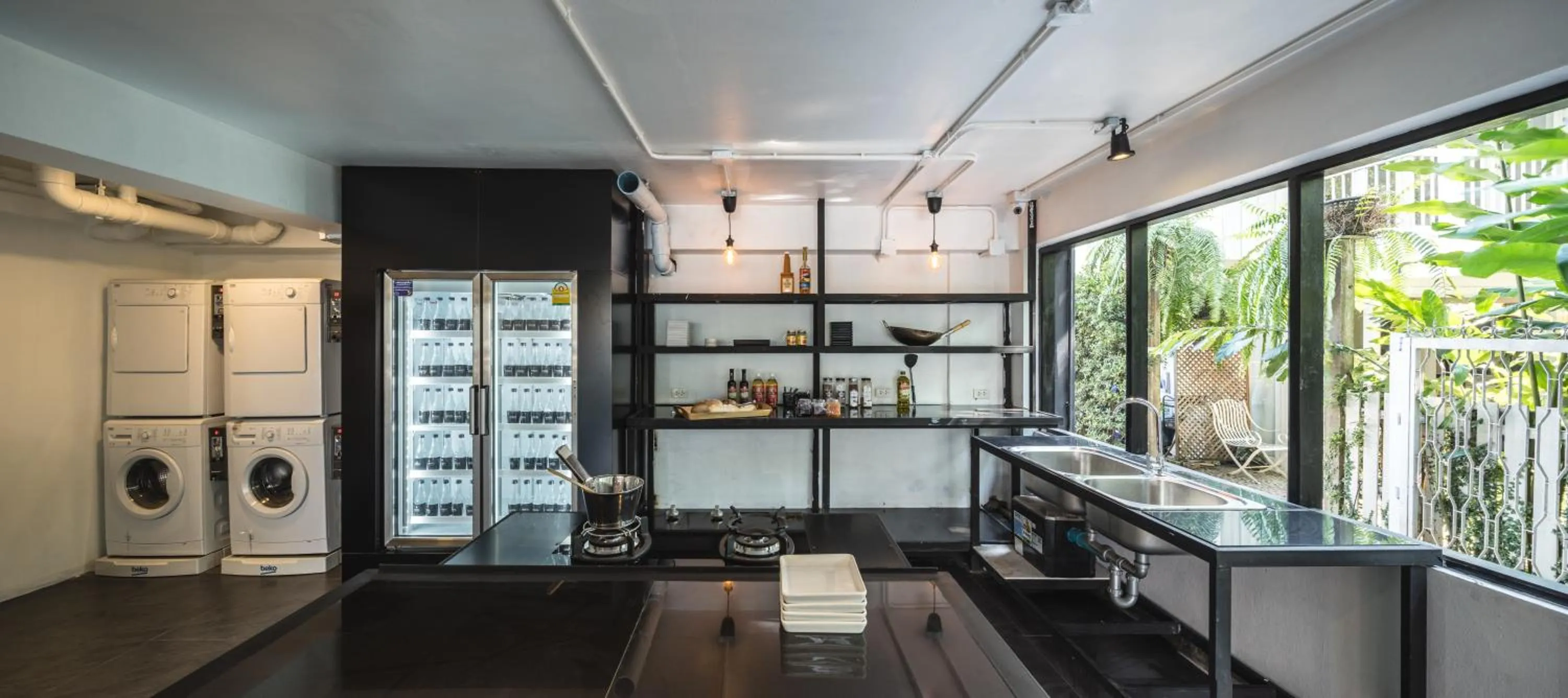 Communal lounge/ TV room in The Common Hostel