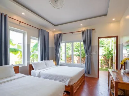 Photo of the whole room, Bed in Trung Huynh Bungalow