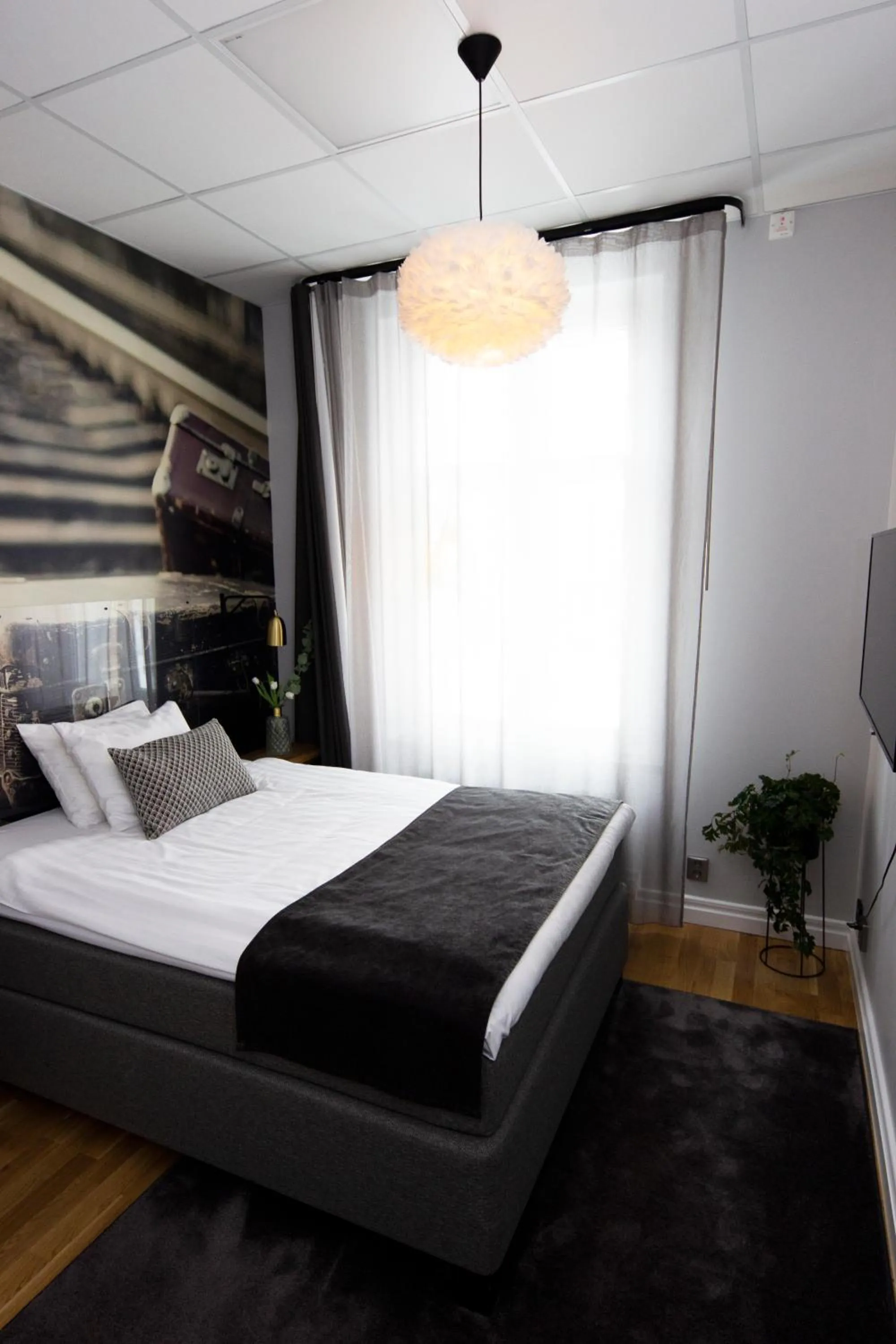 Bed in Livin Station Hotel