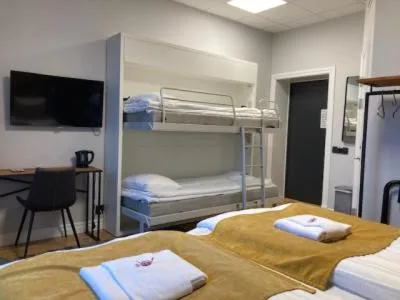 Bed in Livin Station Hotel