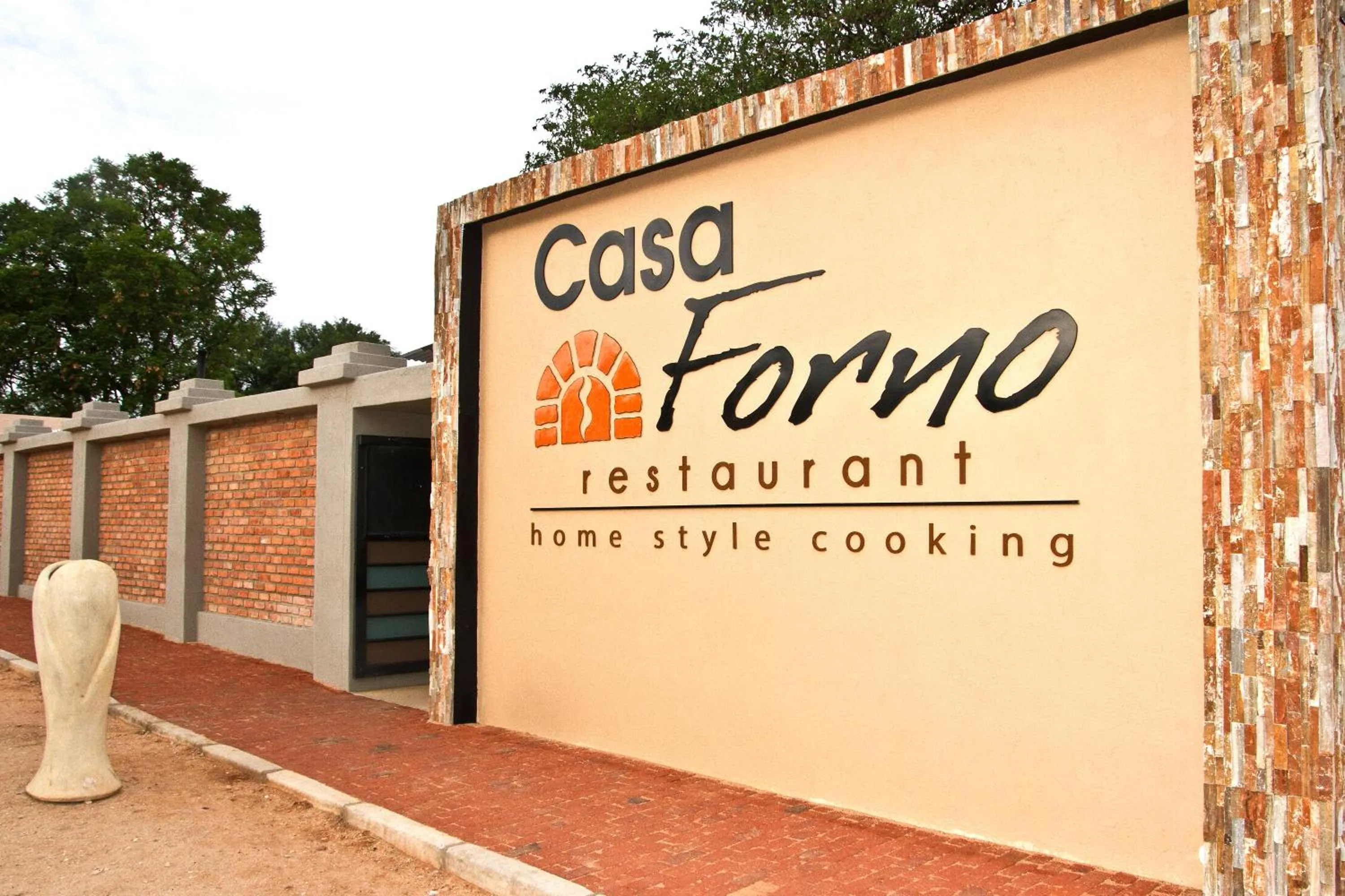 Property logo or sign in Casa Forno Country Hotel