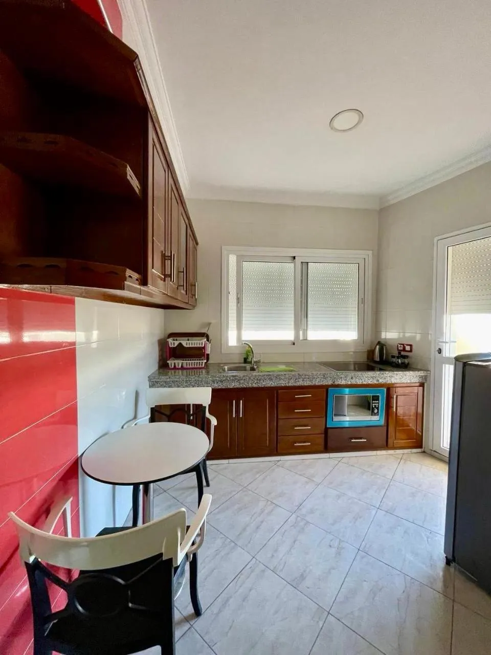 Kitchen or kitchenette in Appart Hotel Rania