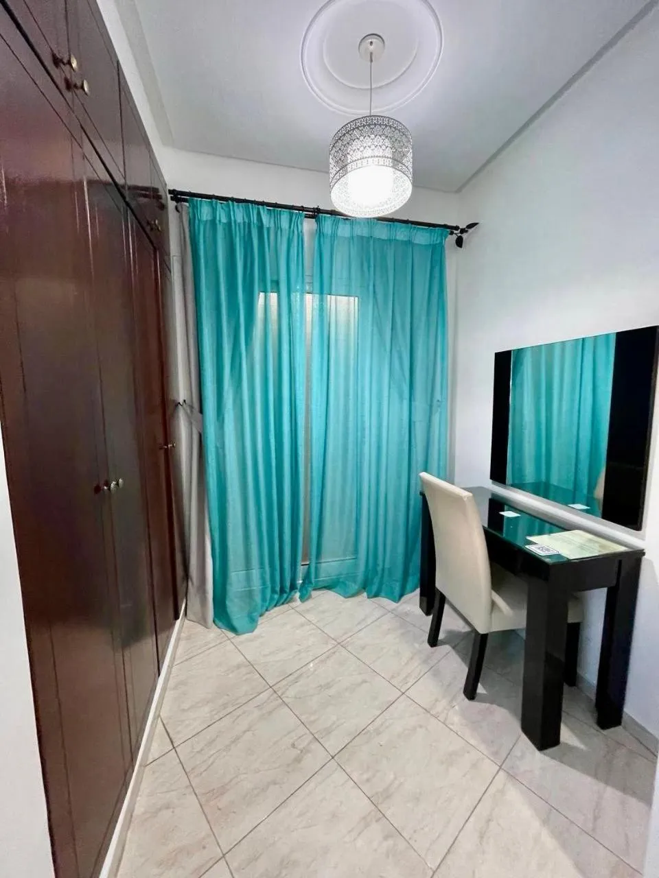 wardrobe in Appart Hotel Rania