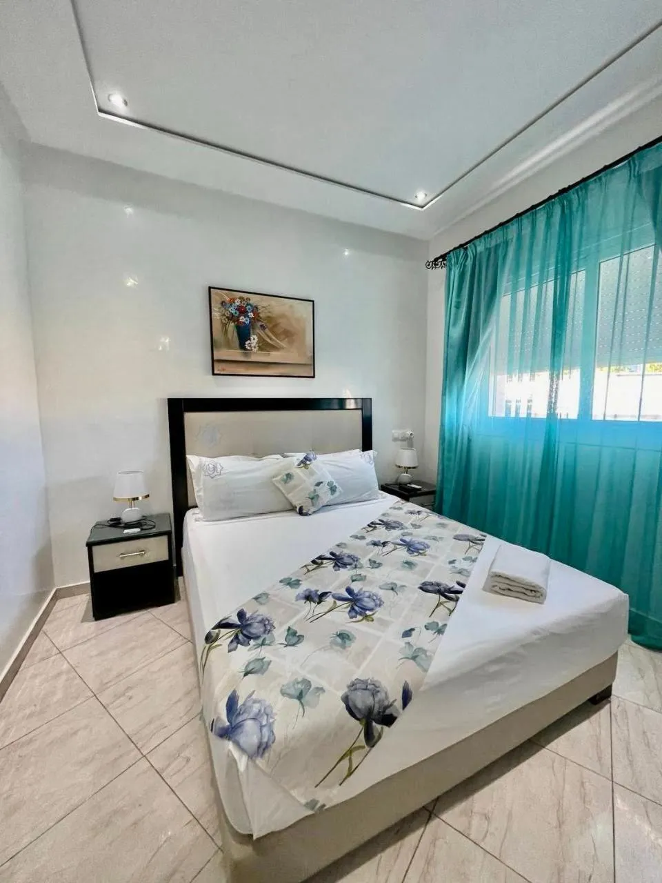 Bed in Appart Hotel Rania