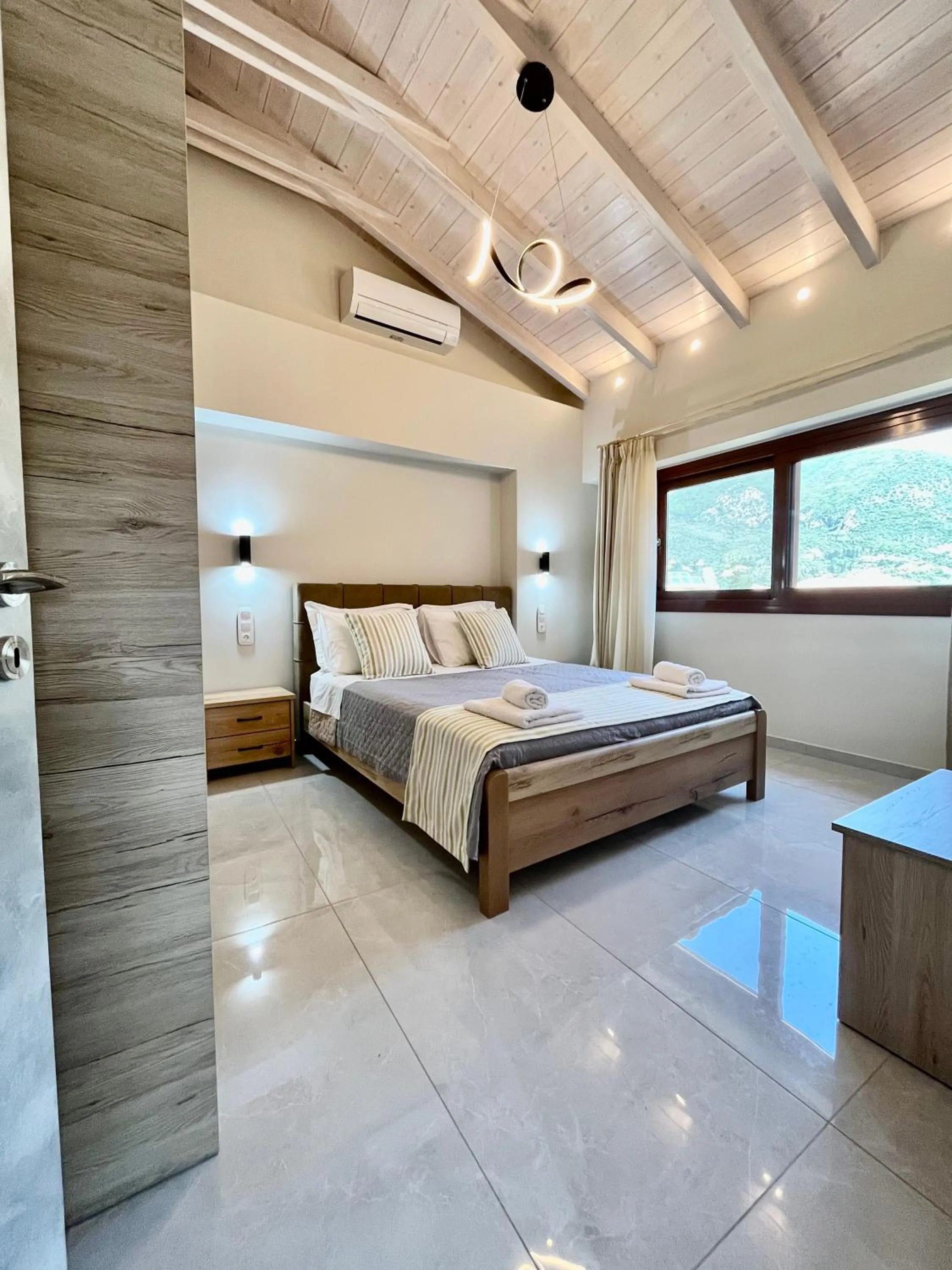 Bed in Emily Apartments
