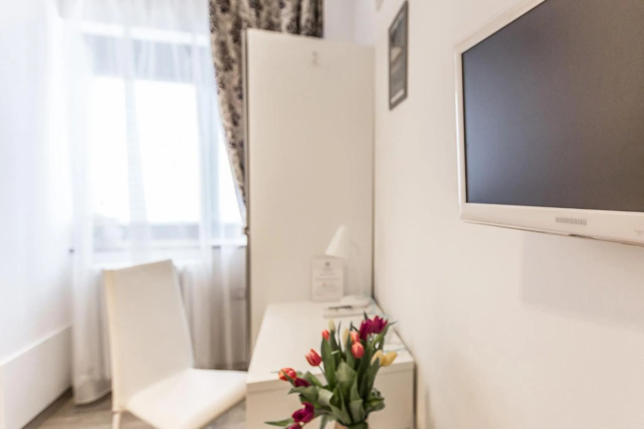 Bedroom in Central City Rooms