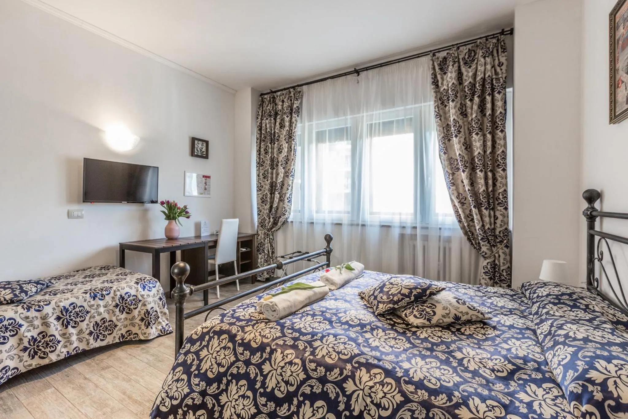 Bed in Central City Rooms