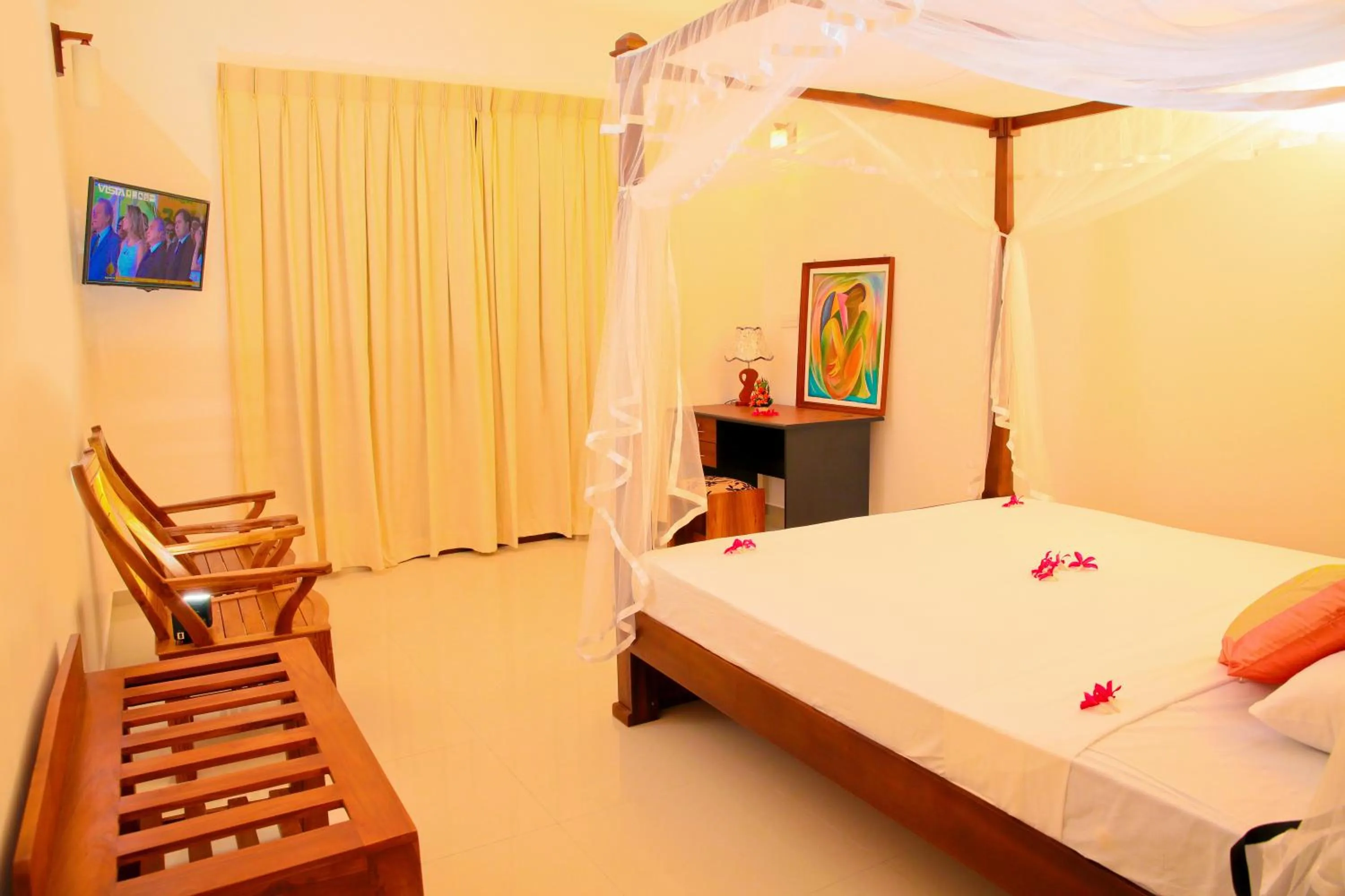 Living room, Bed in Prince Beach Hotel Bentota