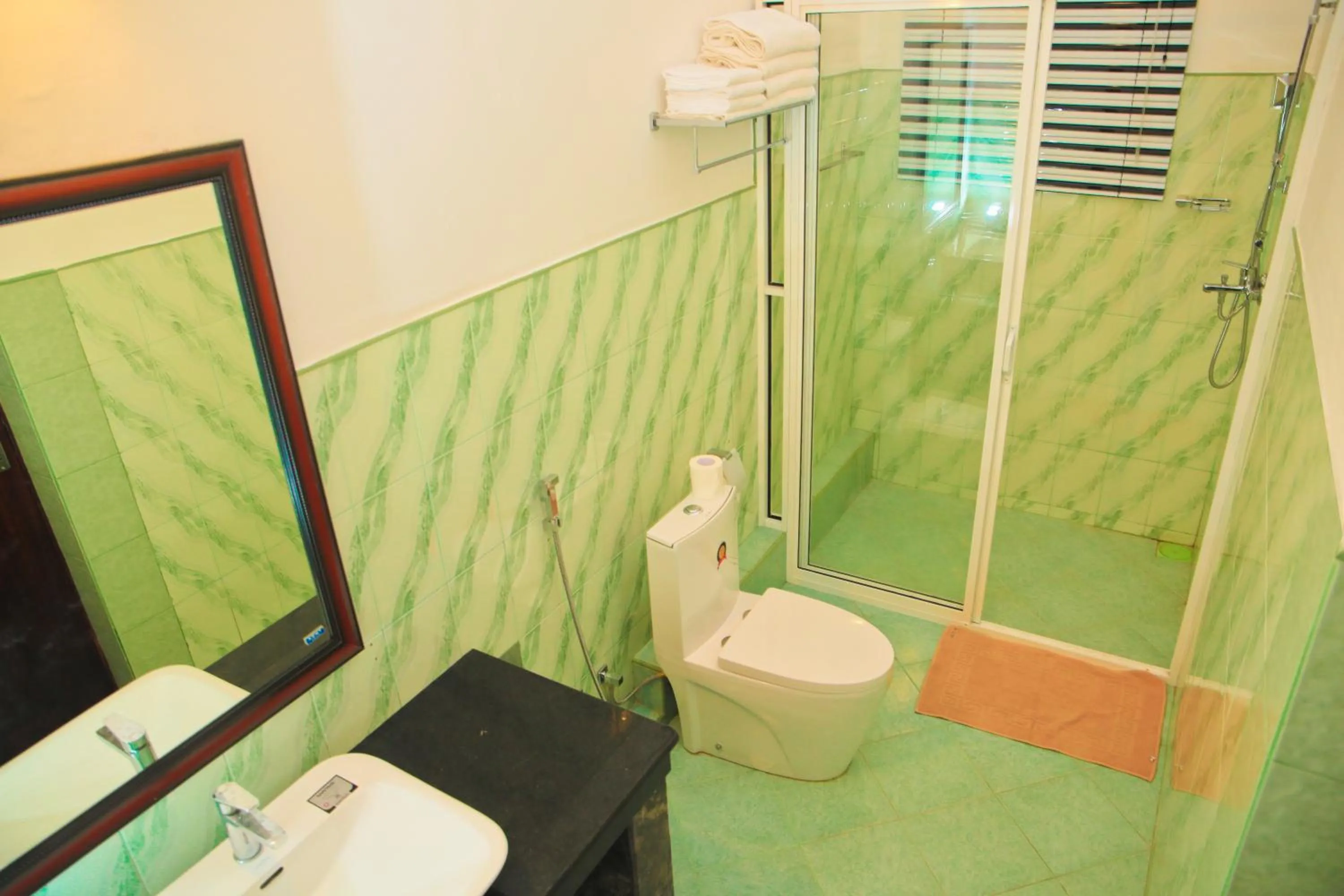 Bathroom in Prince Beach Hotel Bentota