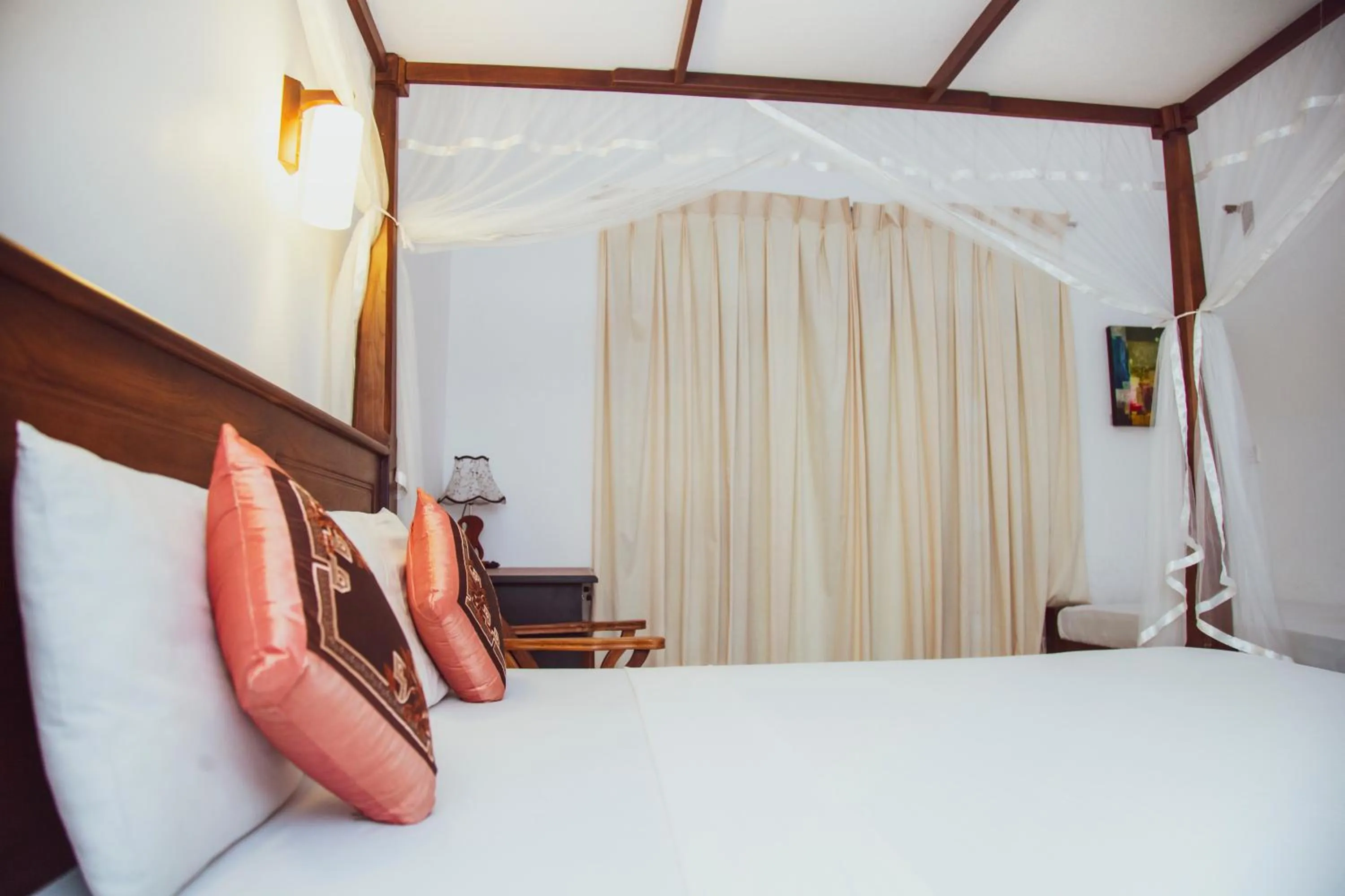 Bed in Prince Beach Hotel Bentota