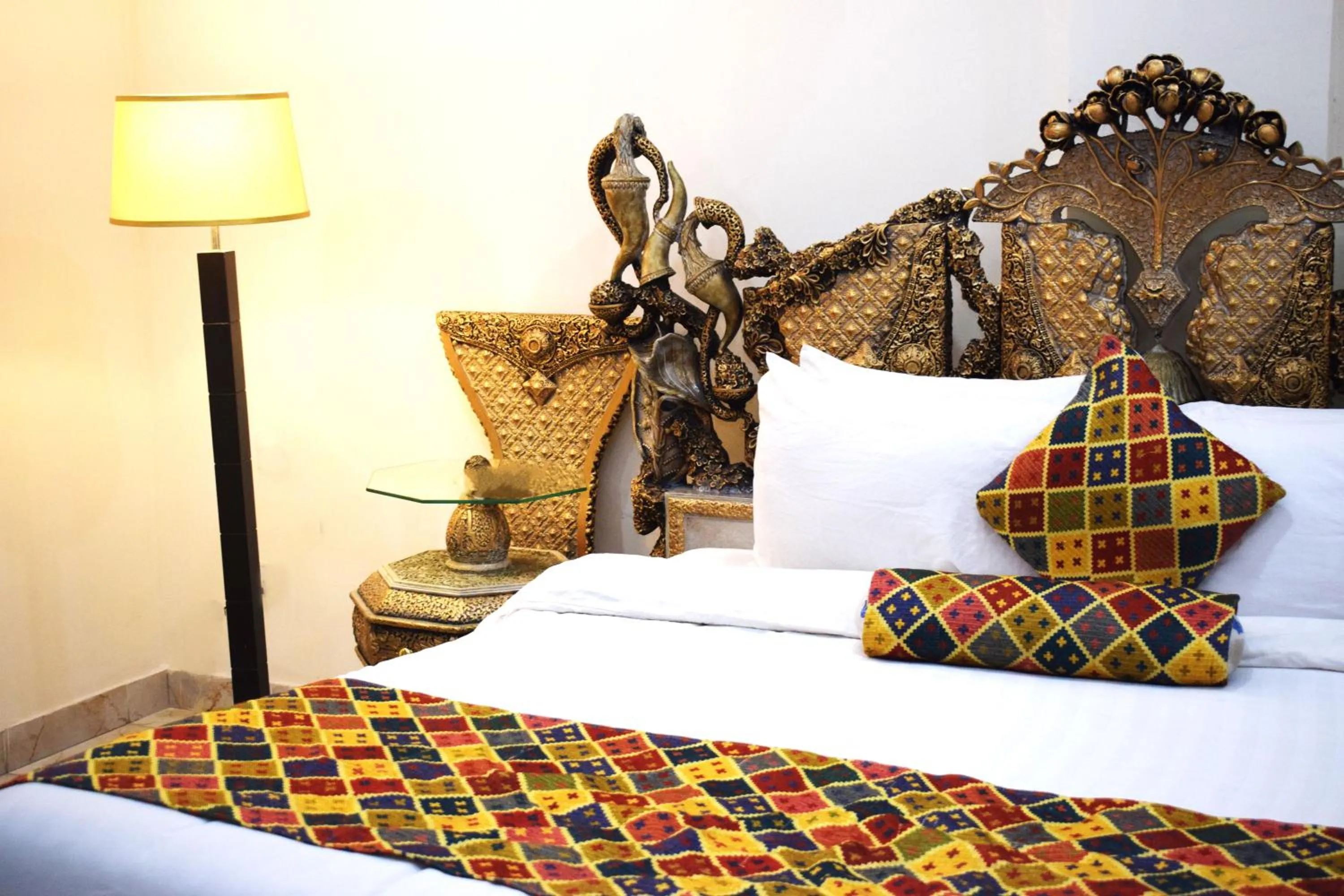 Bed in Grand Millennium Hotel