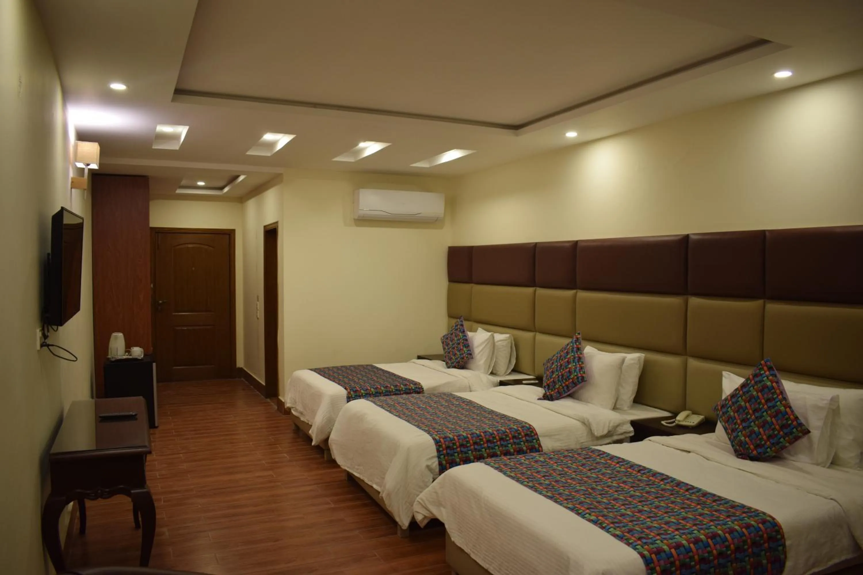 Bed in Grand Millennium Hotel