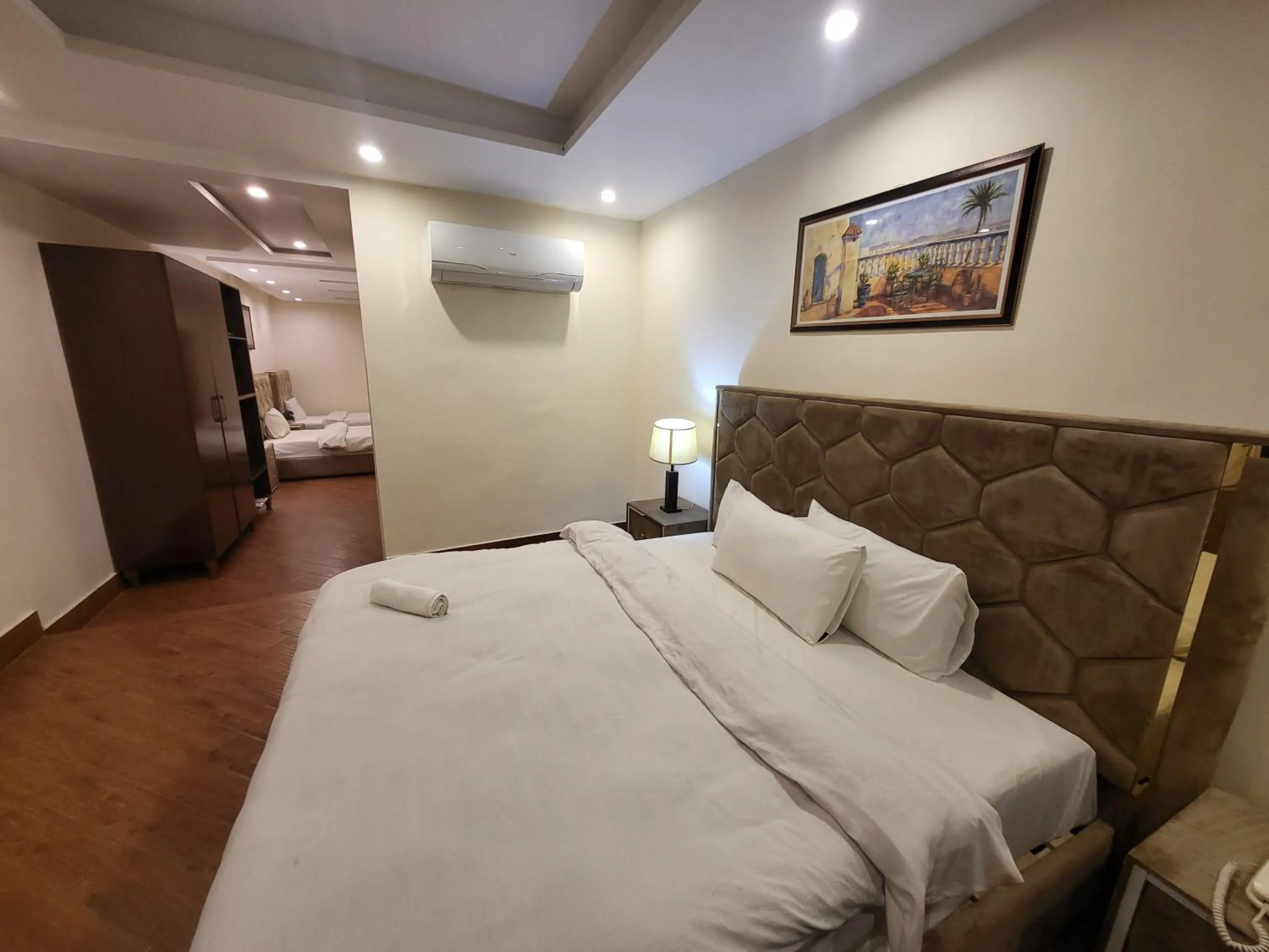 Bed in Grand Millennium Hotel