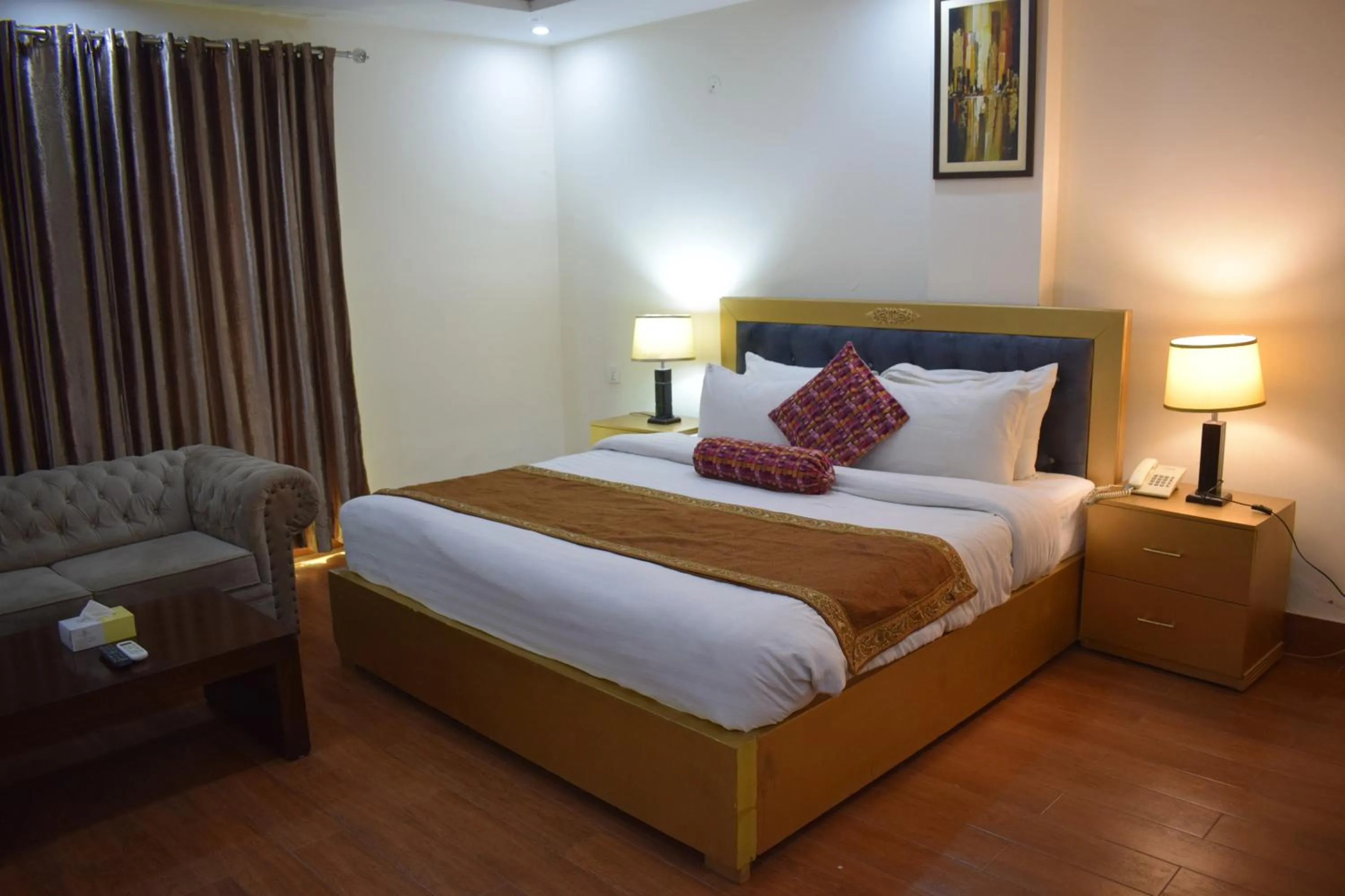 Bed in Grand Millennium Hotel