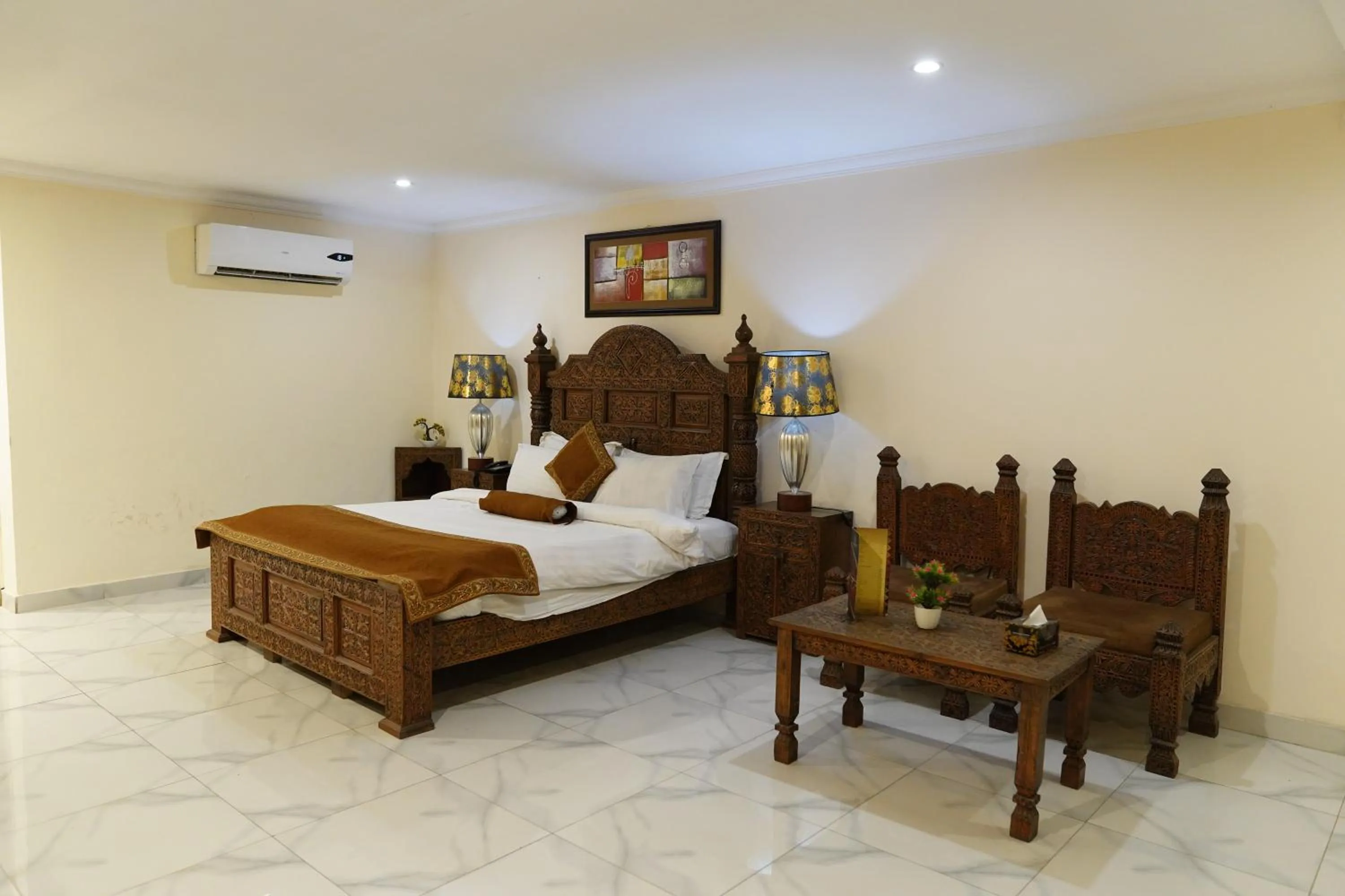 Bed in Grand Millennium Hotel