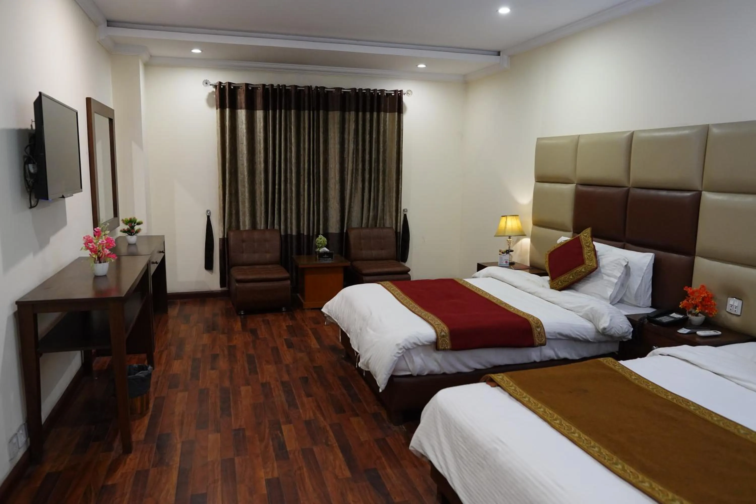 Bed in Grand Millennium Hotel