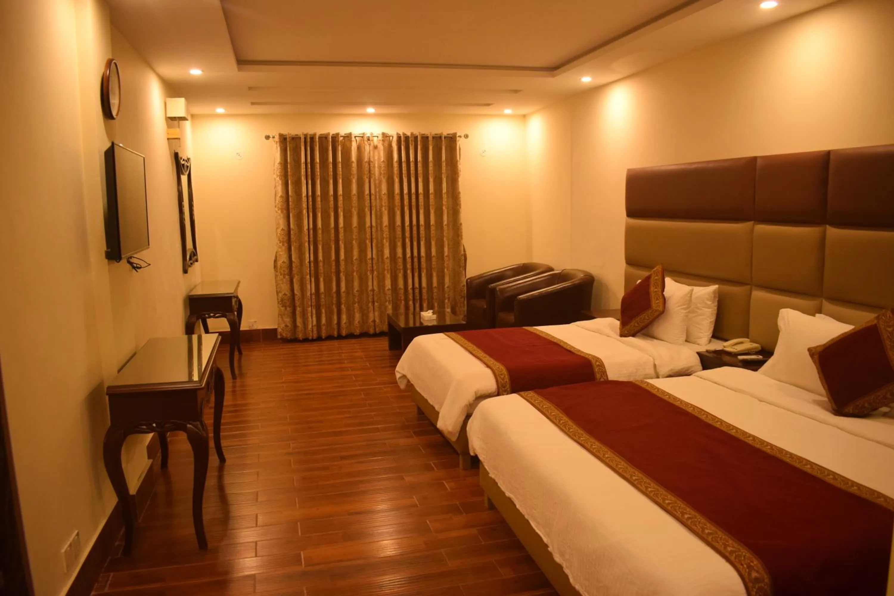 Bed in Grand Millennium Hotel