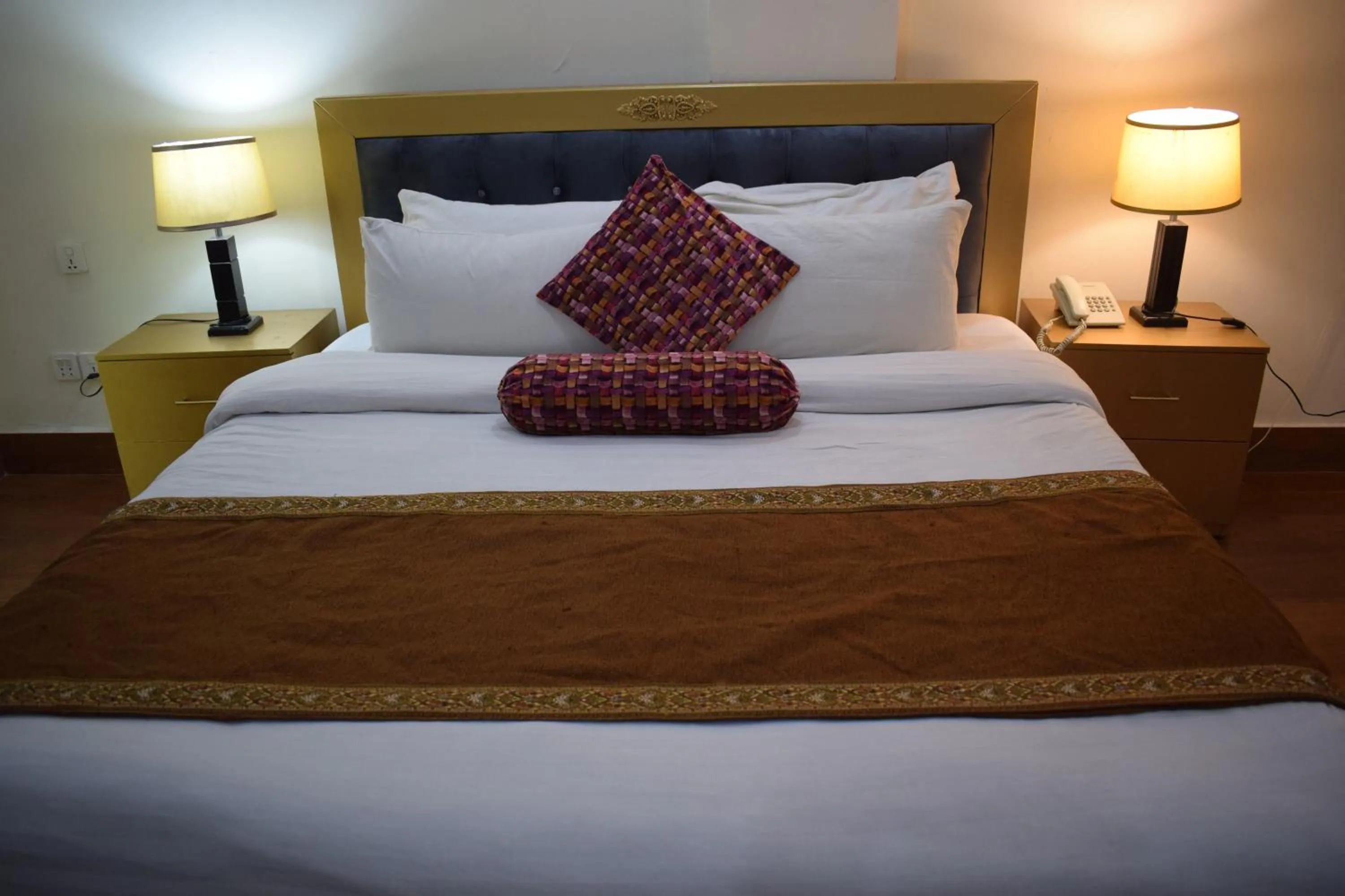 Bed in Grand Millennium Hotel
