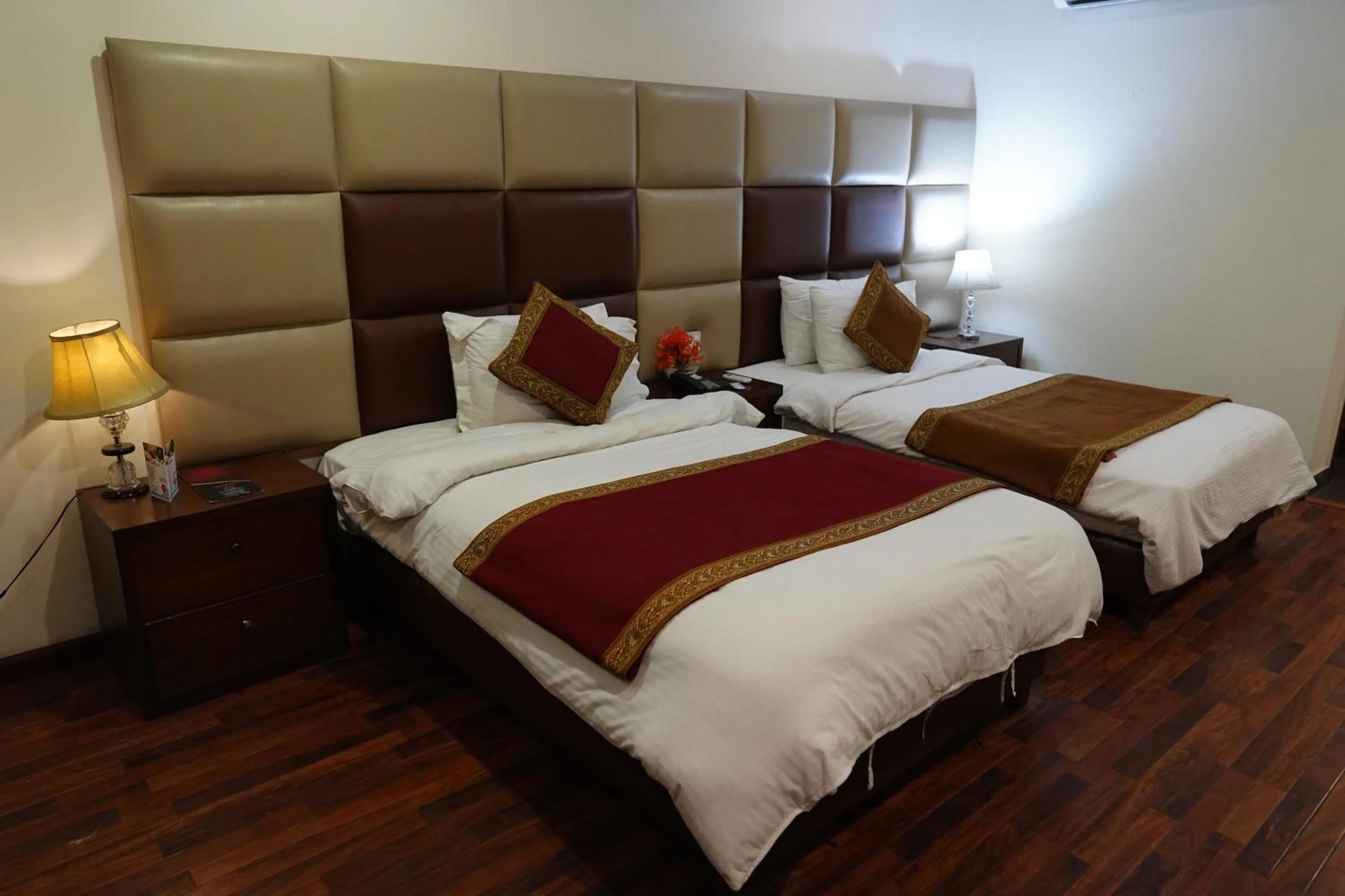 Bed in Grand Millennium Hotel