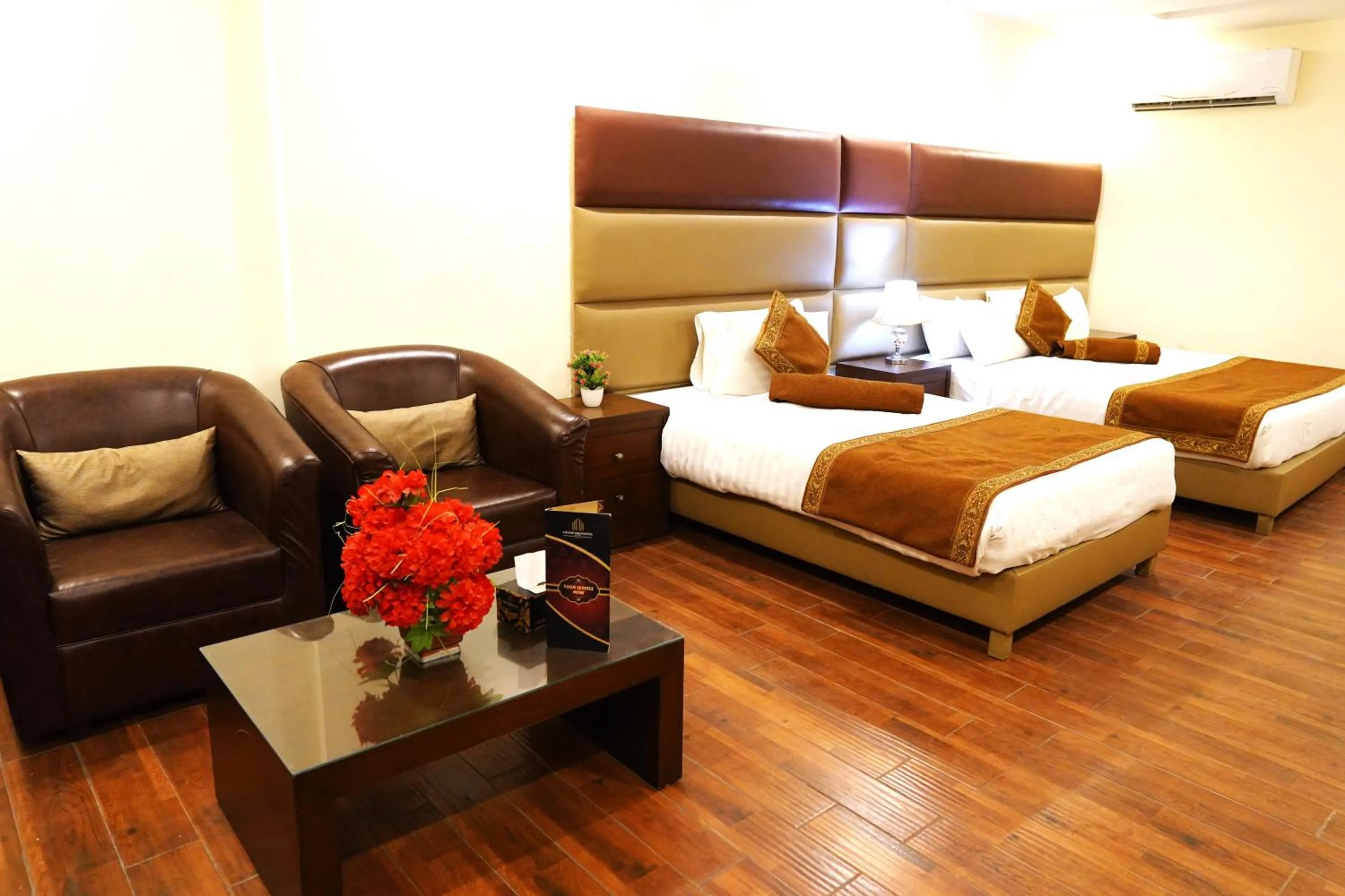 Bed in Grand Millennium Hotel