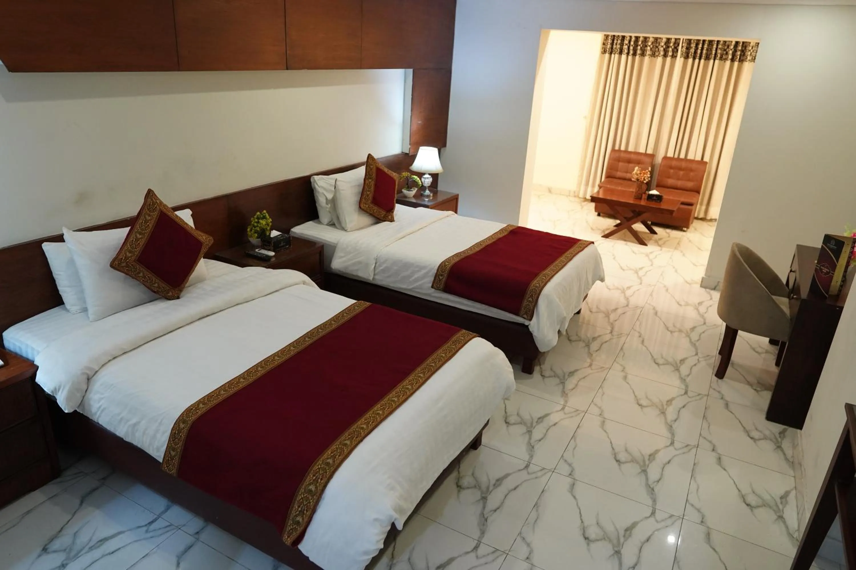 Photo of the whole room, Bed in Grand Millennium Hotel