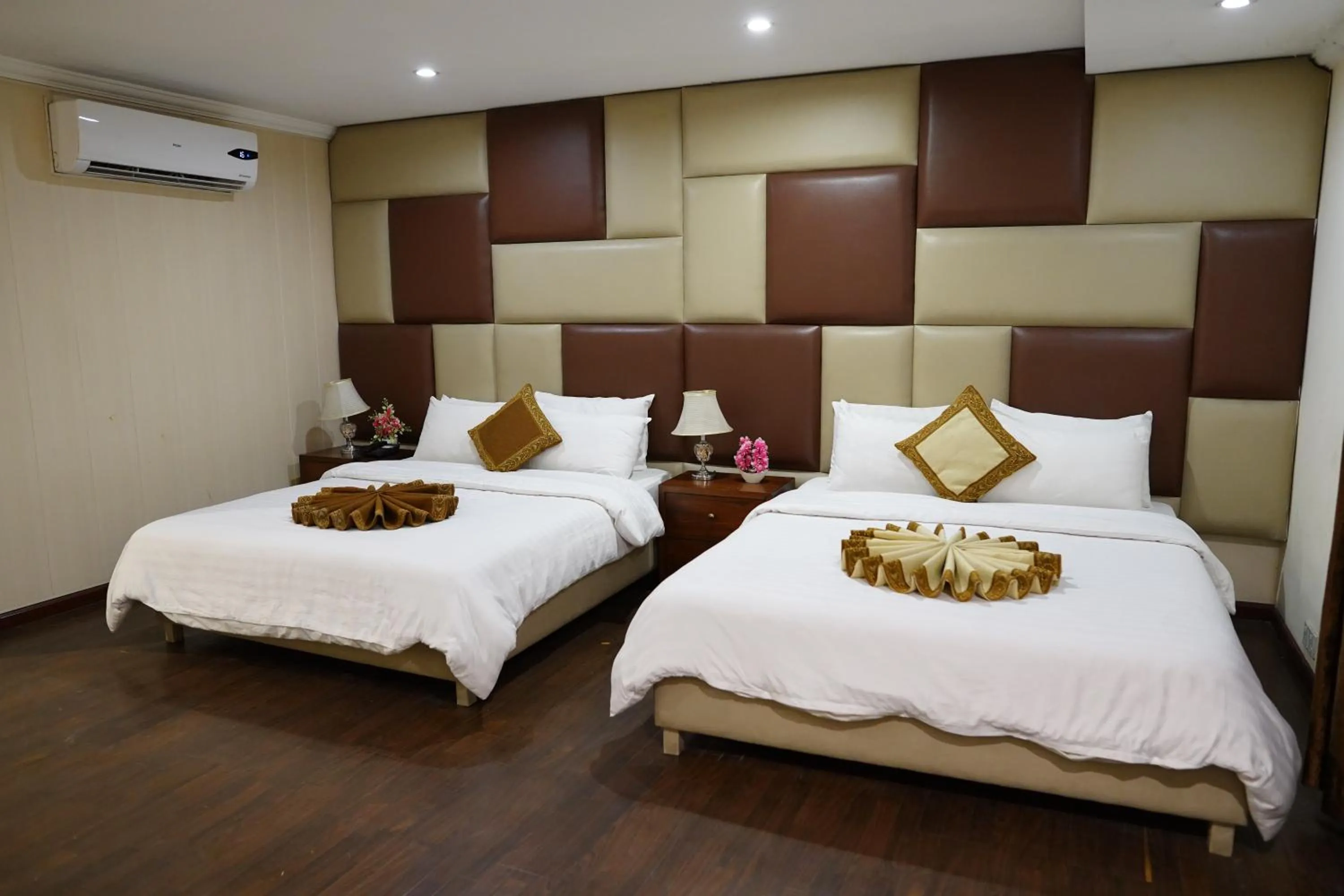 Bed in Grand Millennium Hotel