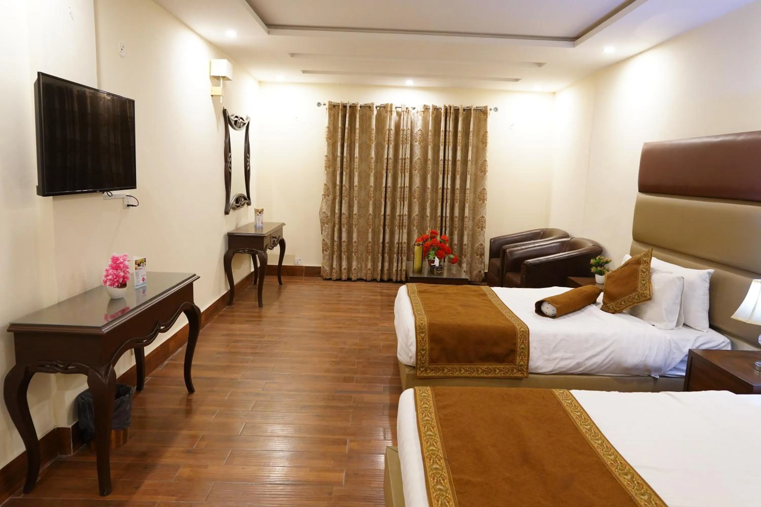 Bed in Grand Millennium Hotel