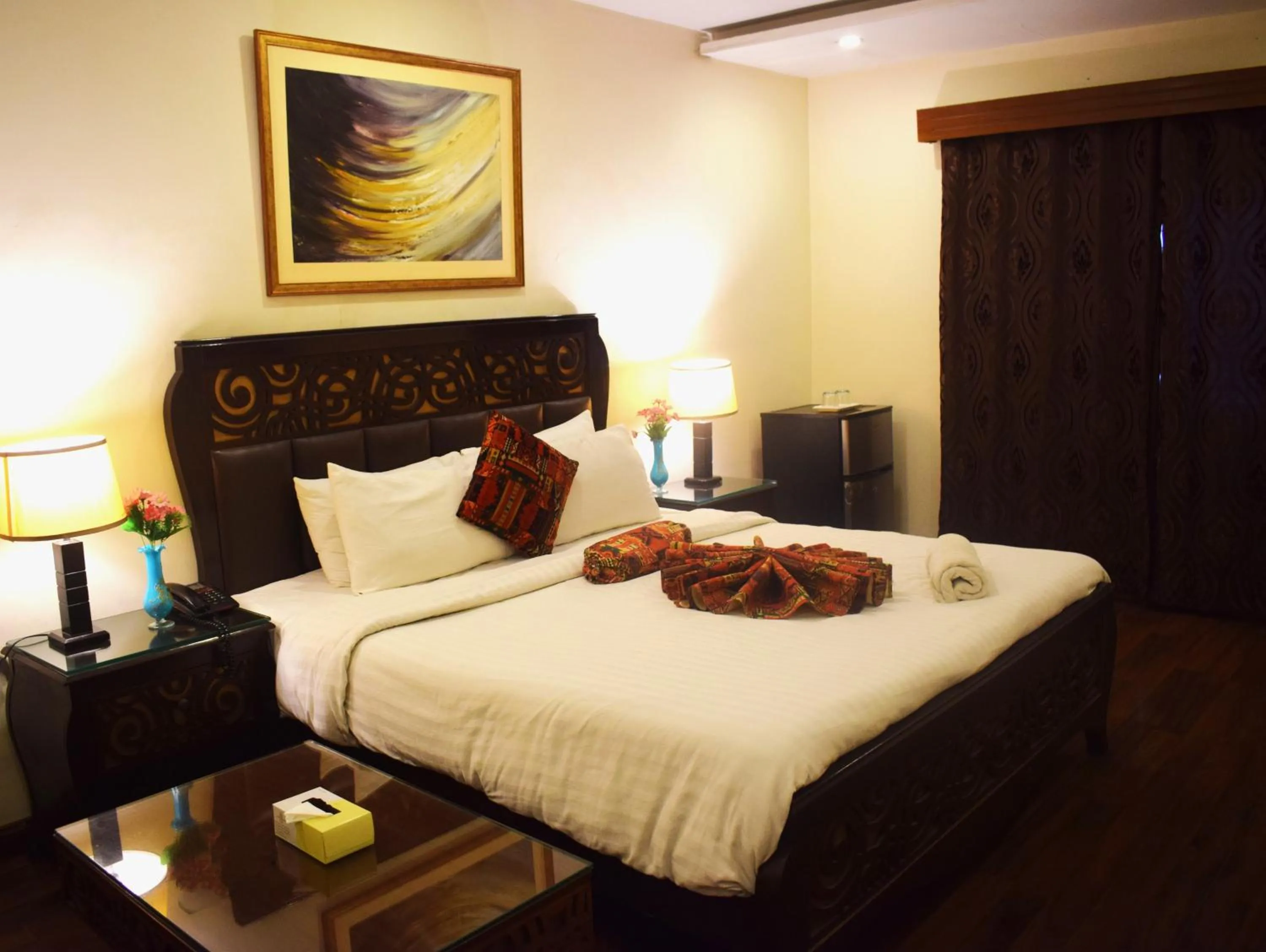 Bed in Grand Millennium Hotel