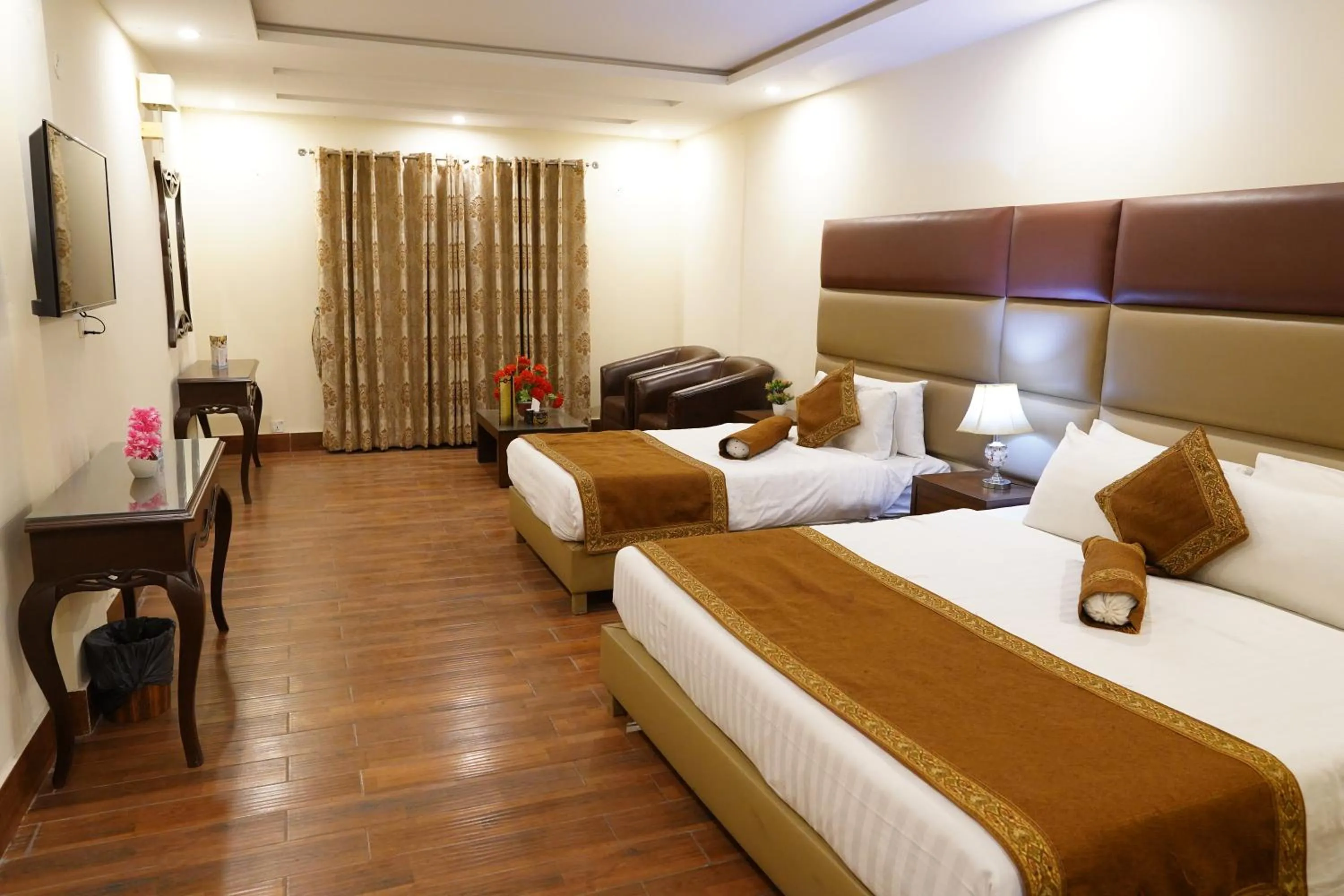 Bed in Grand Millennium Hotel