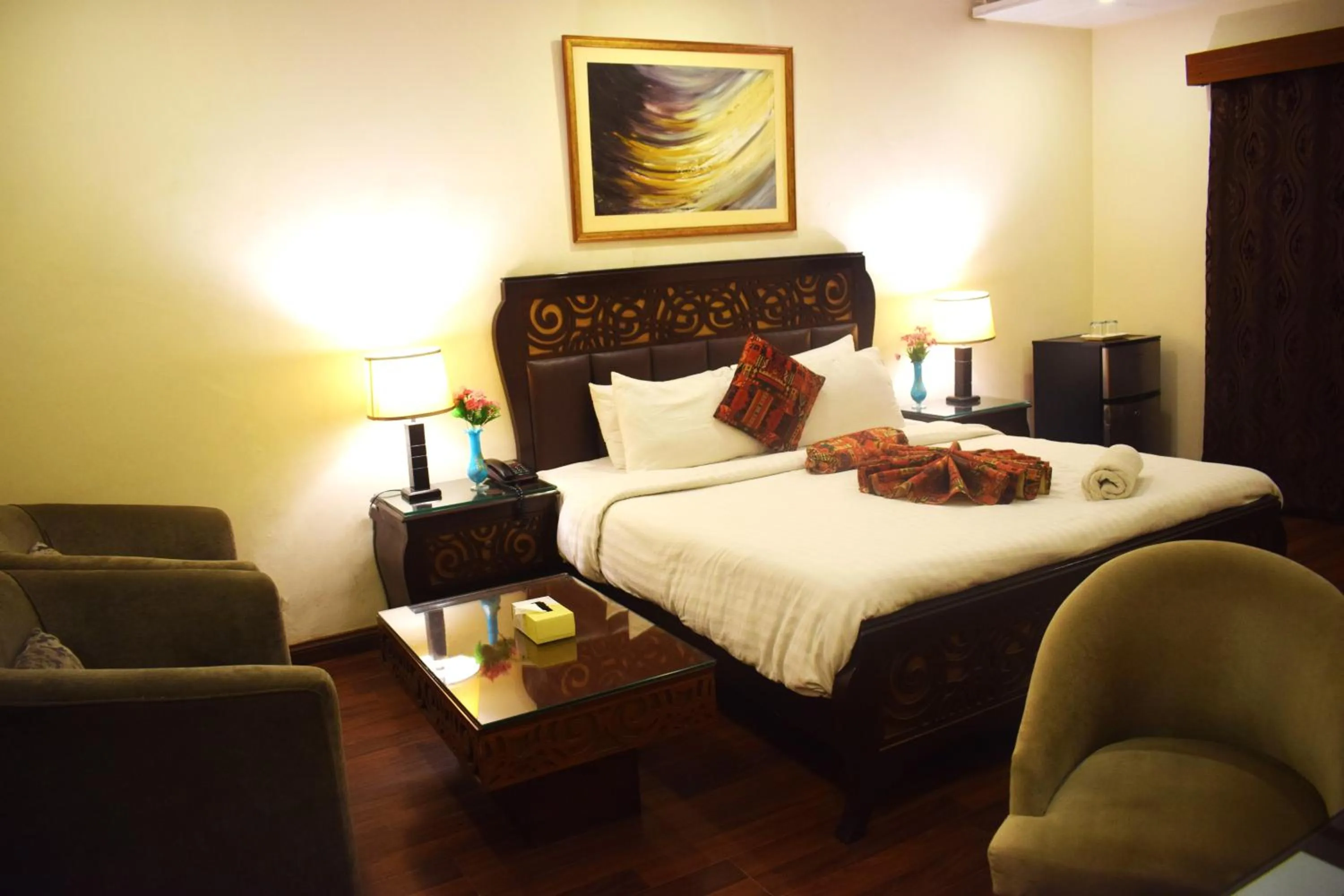 Bed in Grand Millennium Hotel