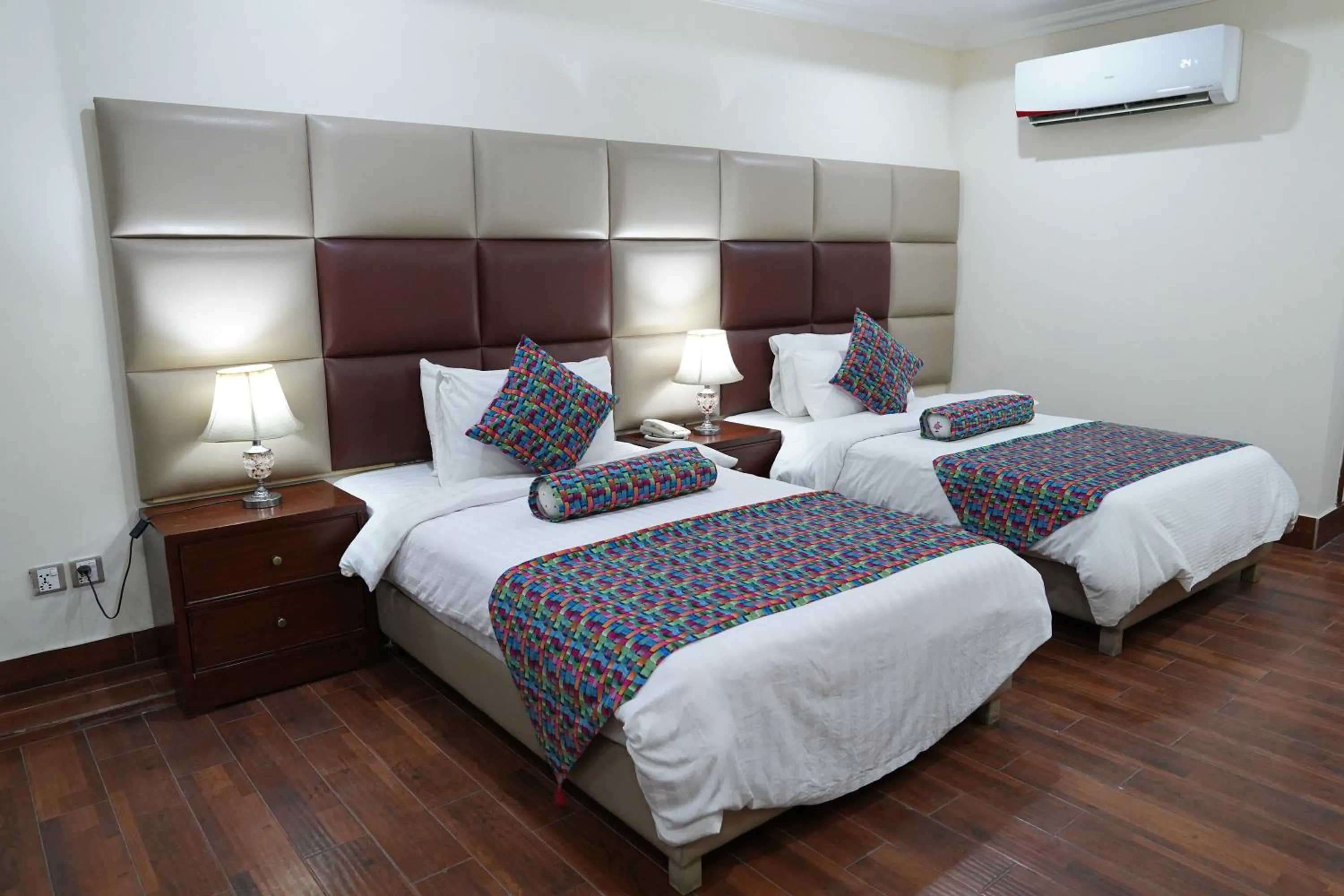 Bed in Grand Millennium Hotel