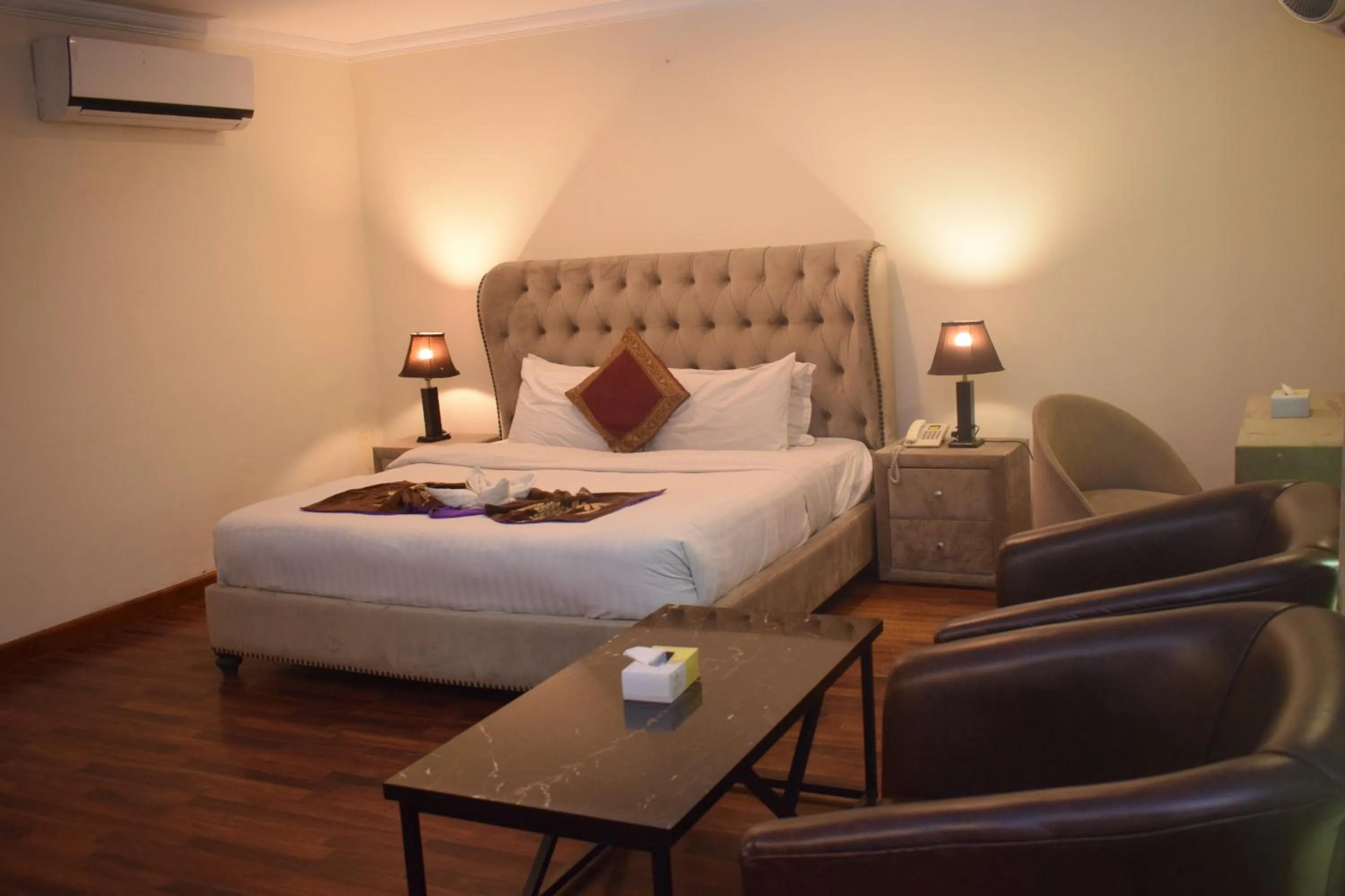 Bed in Grand Millennium Hotel