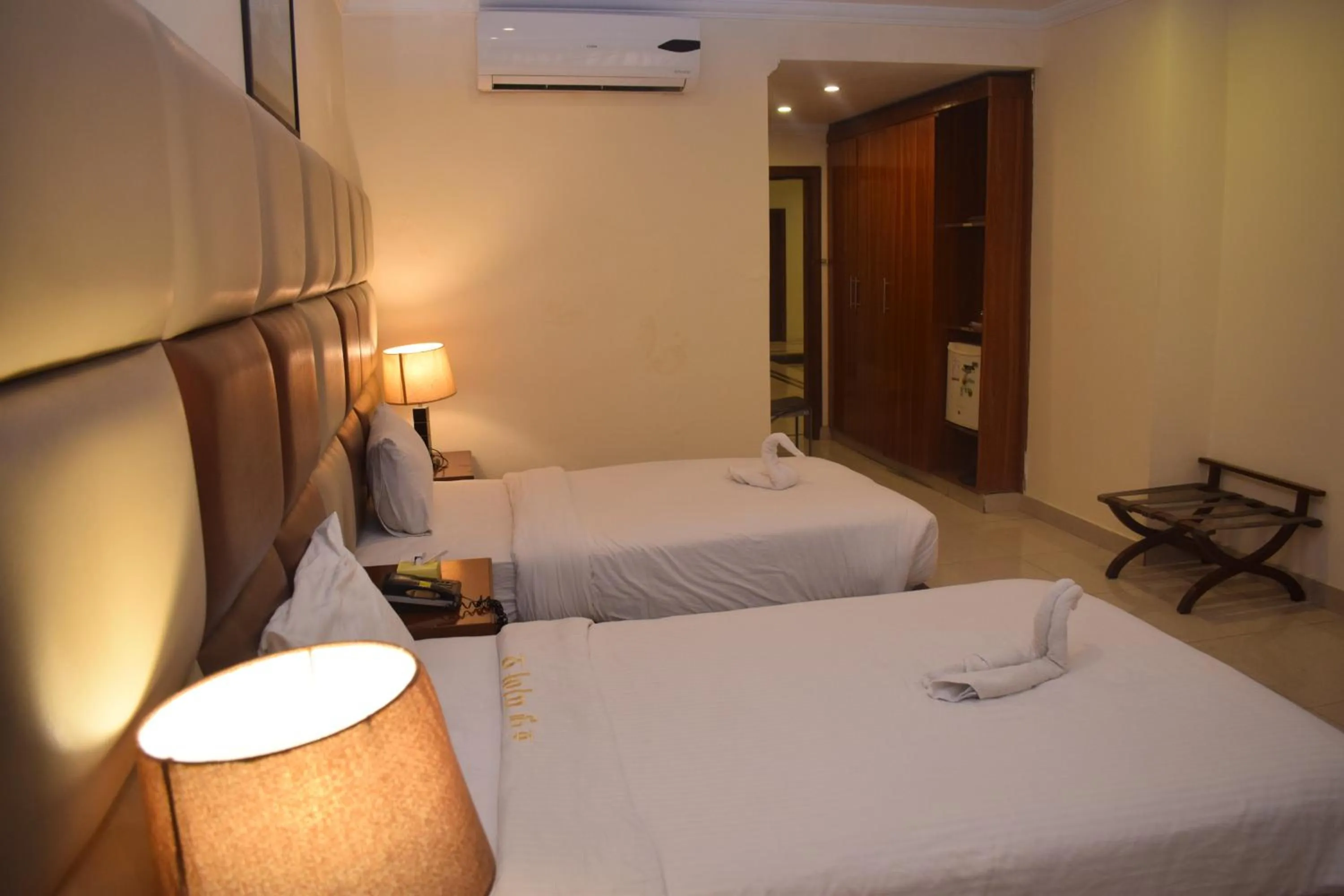 Bed in Grand Millennium Hotel