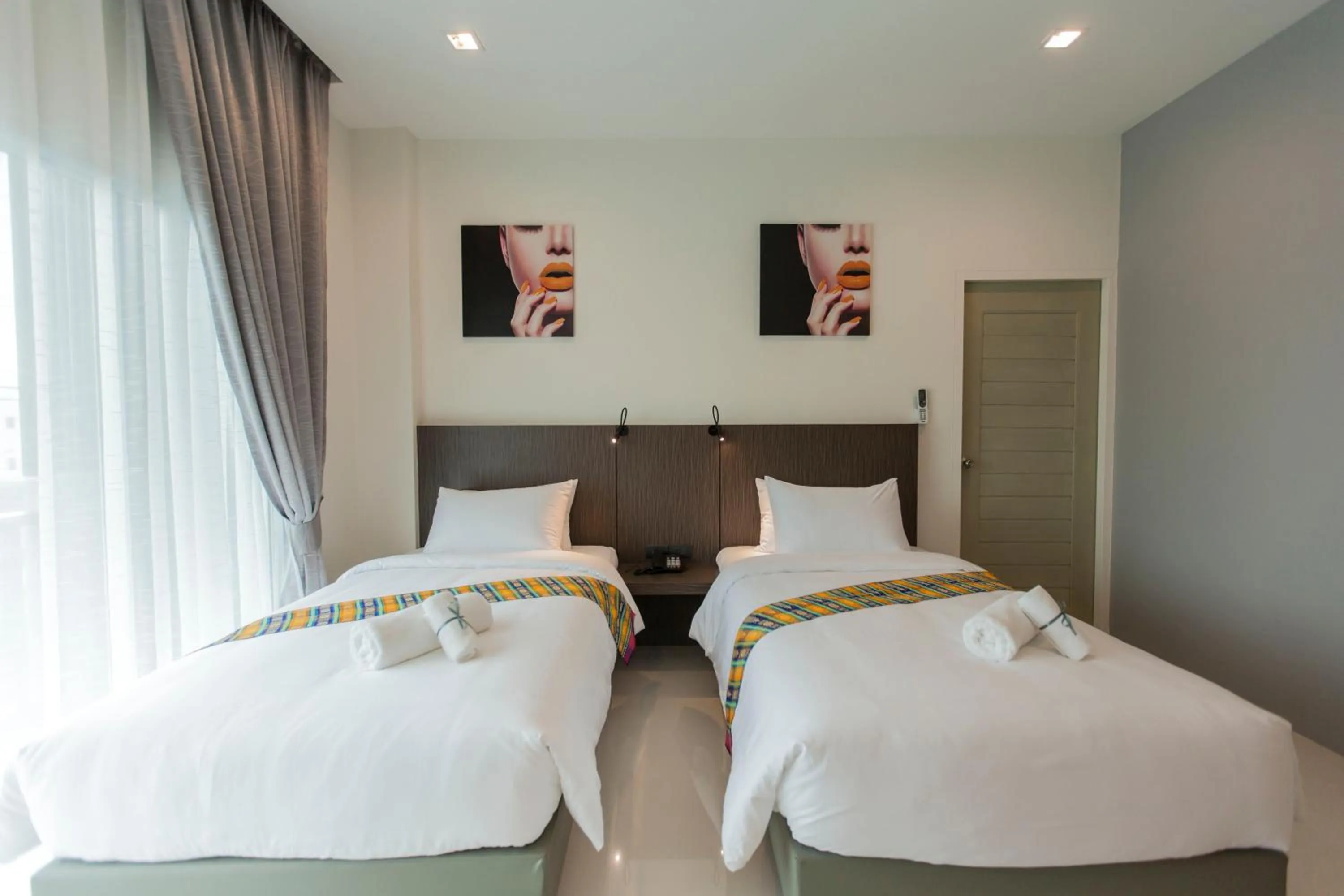 Photo of the whole room, Bed in The Elysium Residence - SHA Extra Plus