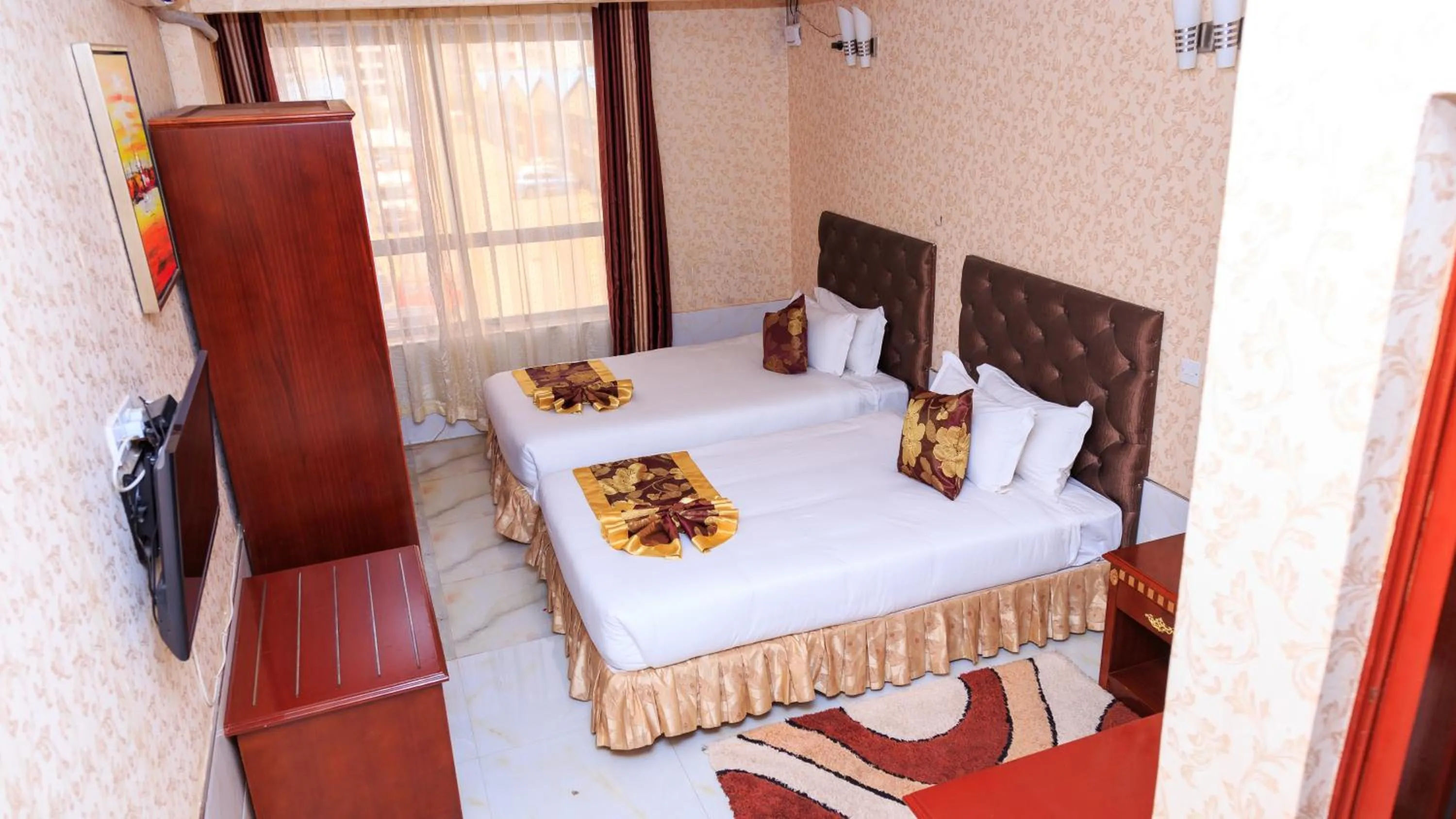 View (from property/room), Bed in Easy Hotel Kenya