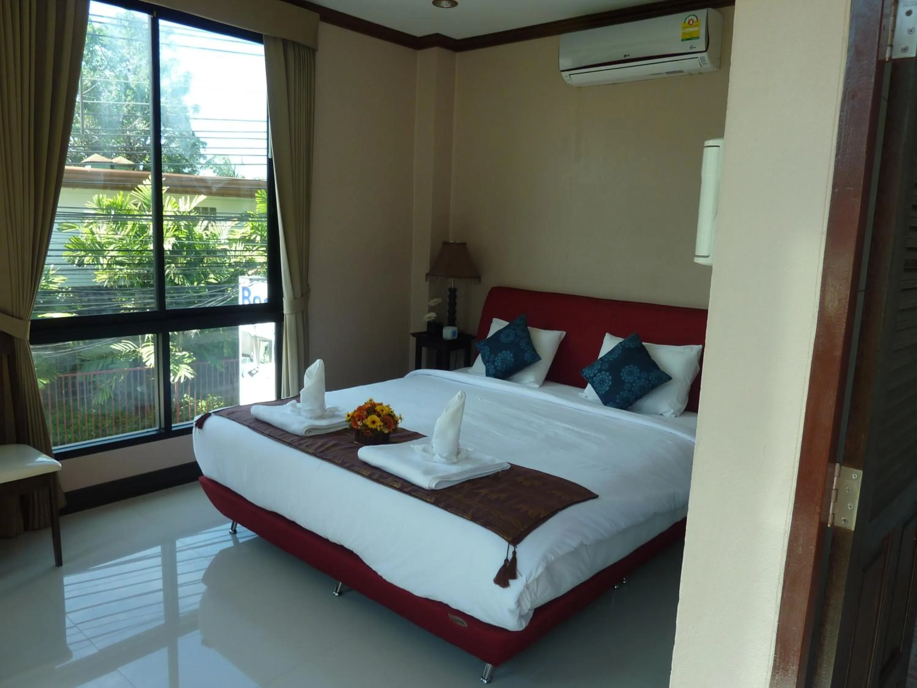 Bed in Kata Beachwalk Hotel and Bungalows