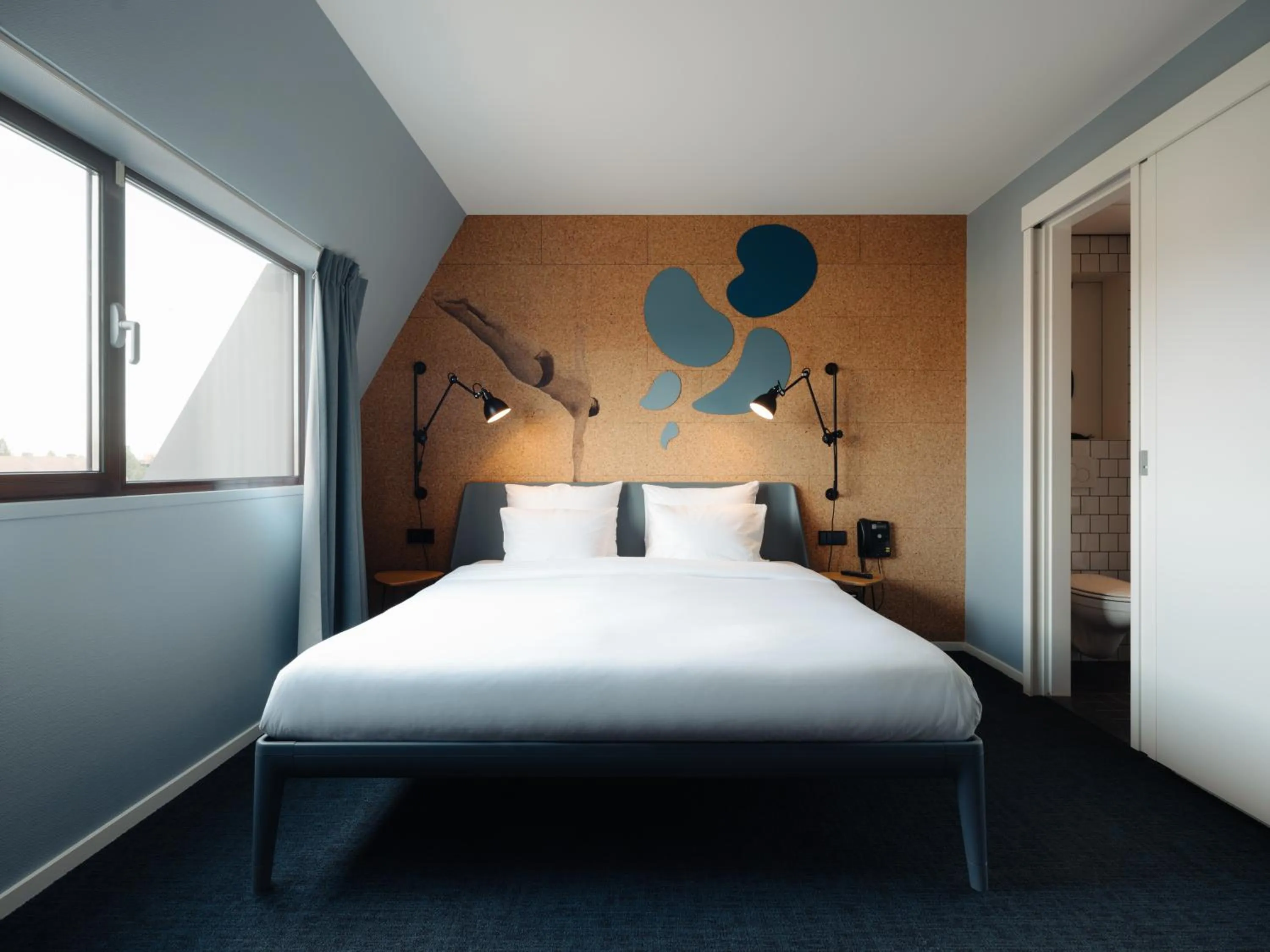 Bed in Conscious Hotel The Tire Station