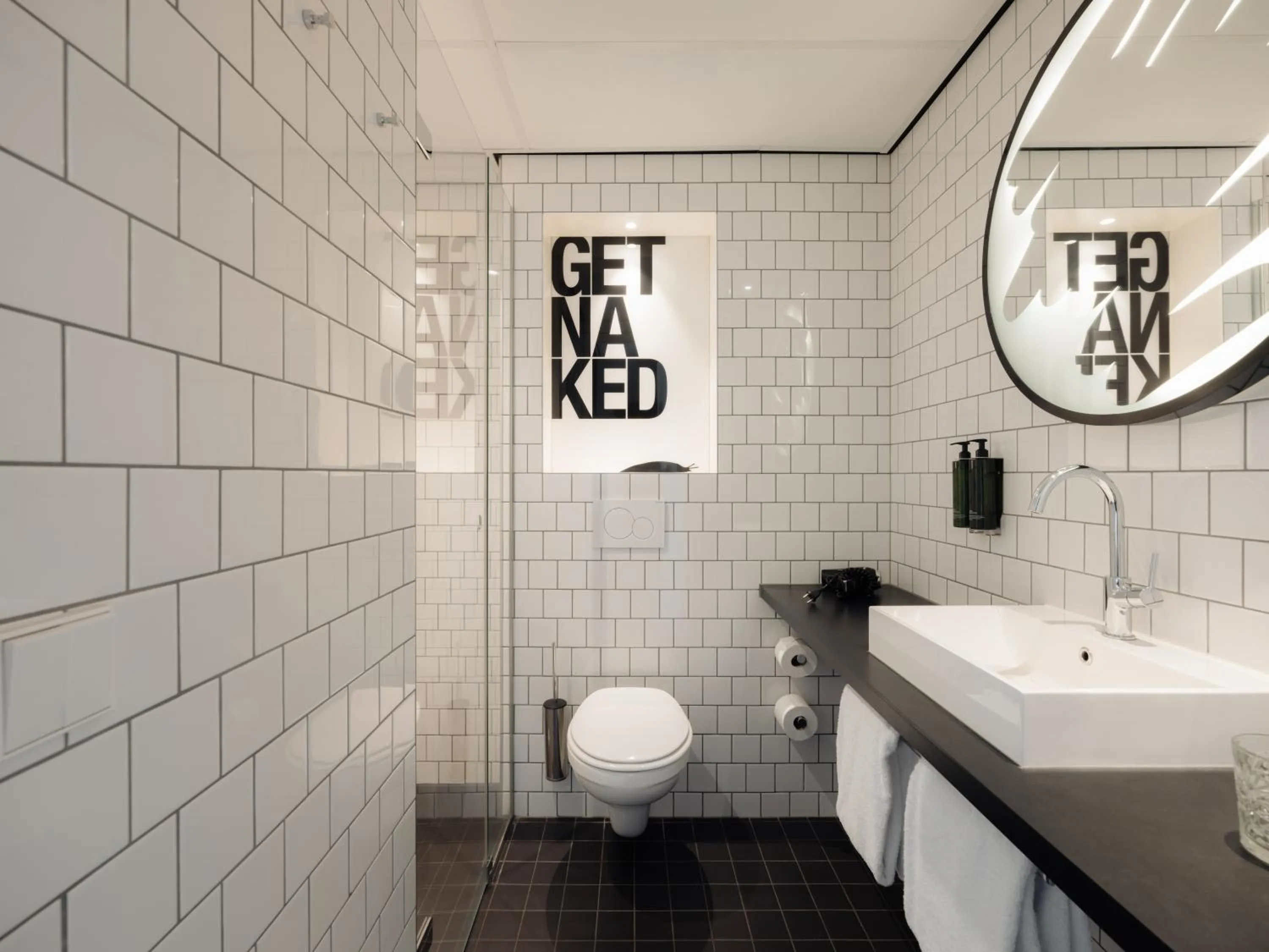 Toilet in Conscious Hotel The Tire Station