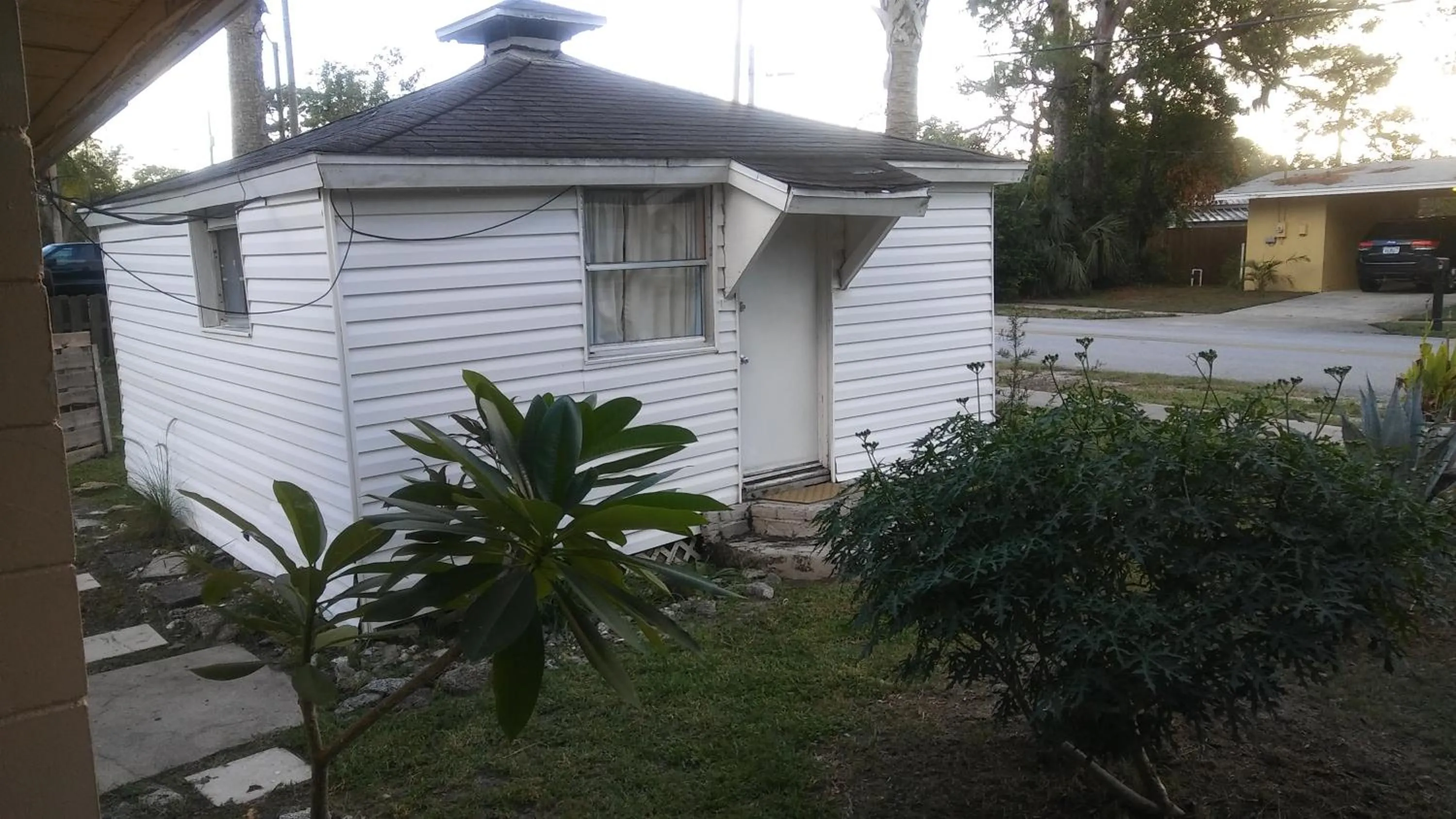 Property building in 1 Beige Cozy Bungalow or 1 White Cozy Efficiency Cottage in Titusville