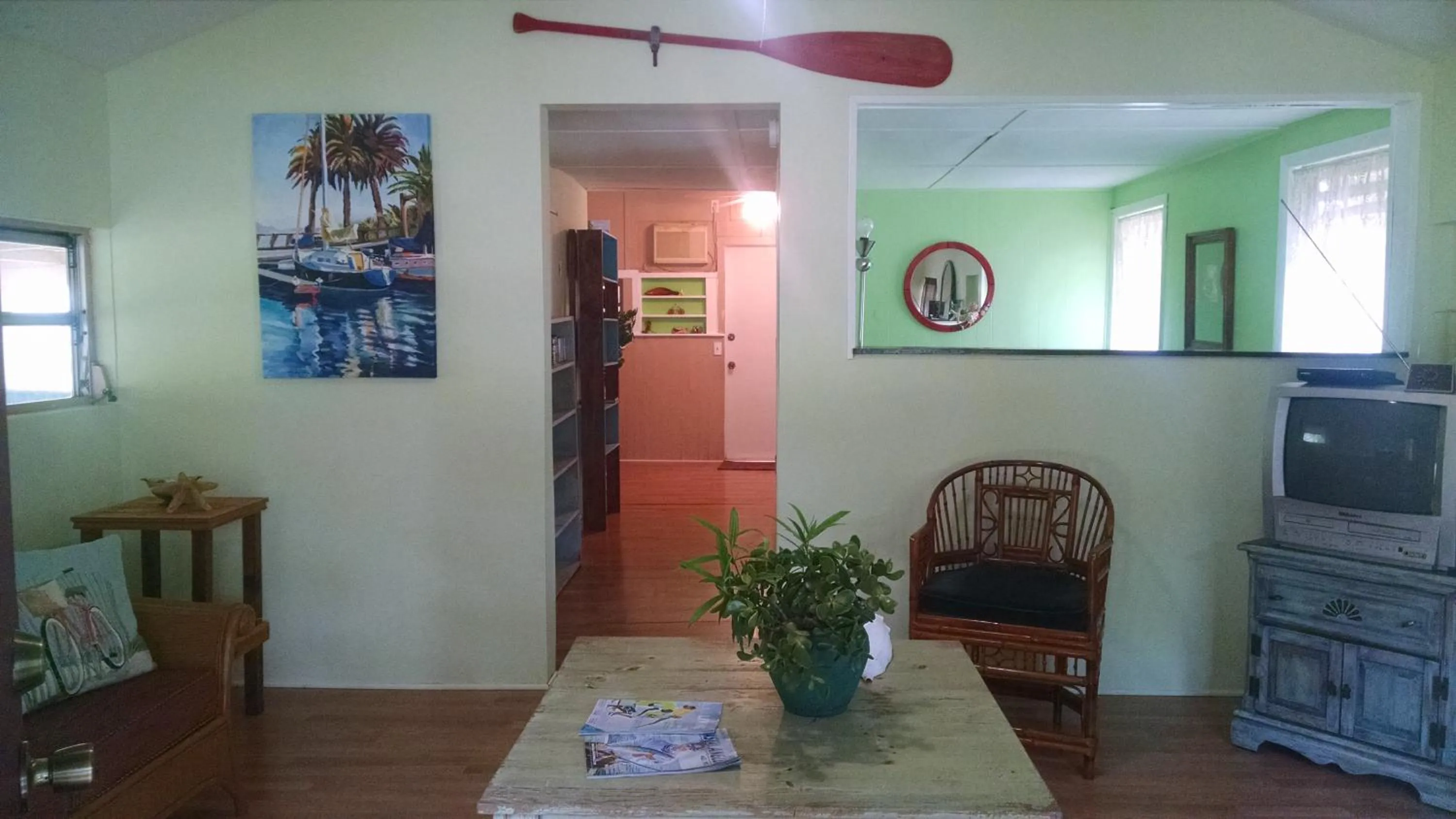 Living room in 1 Beige Cozy Bungalow or 1 White Cozy Efficiency Cottage in Titusville