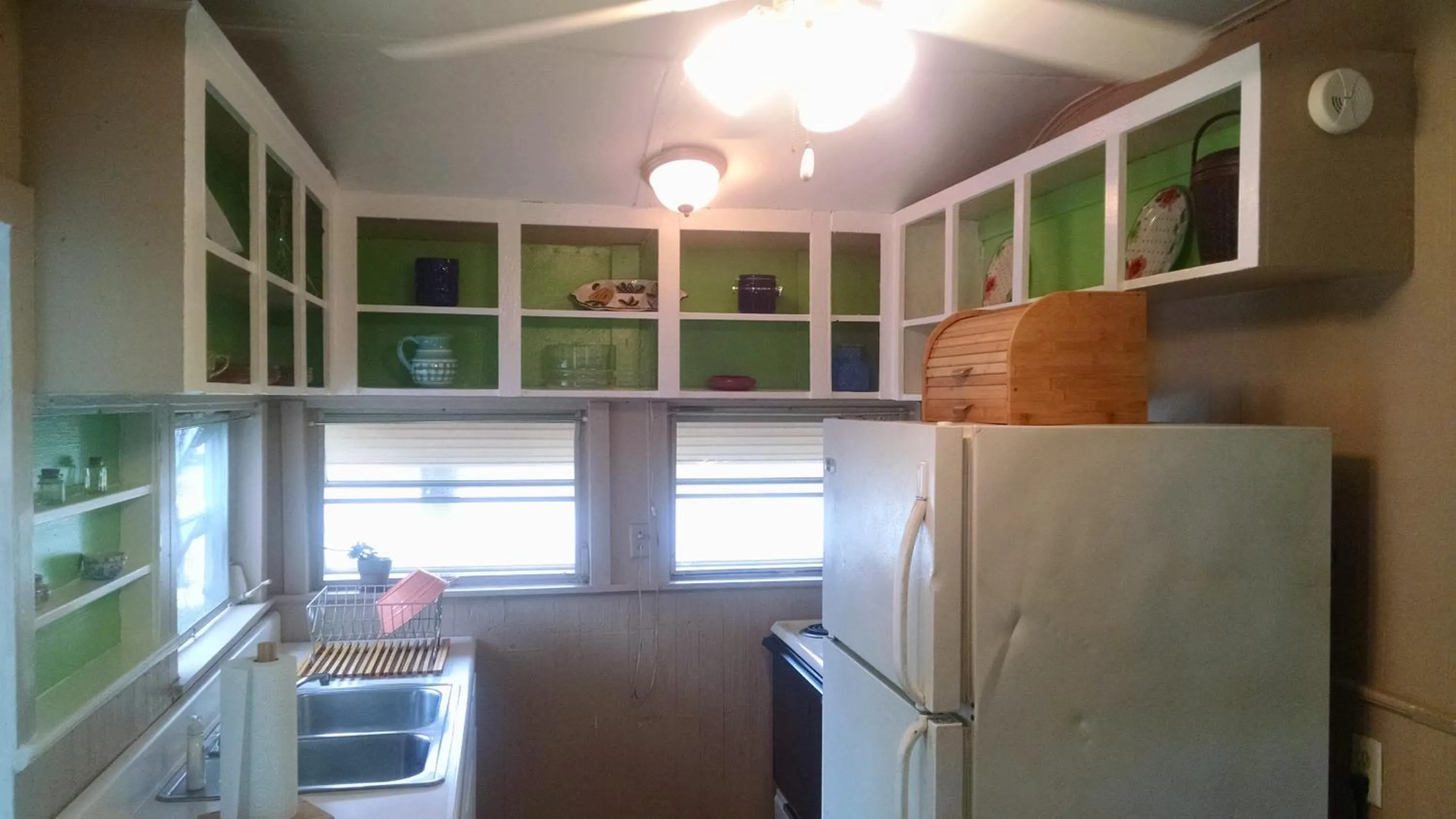 Kitchen or kitchenette in 1 Beige Cozy Bungalow or 1 White Cozy Efficiency Cottage in Titusville
