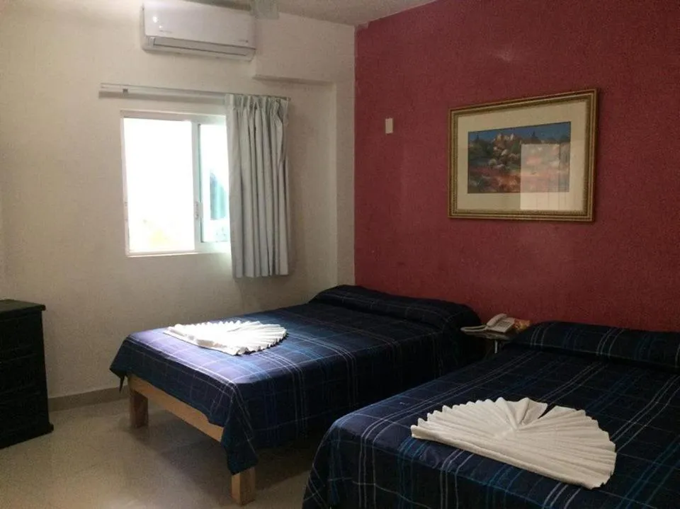 Bed in Casa del Parque Vallarta