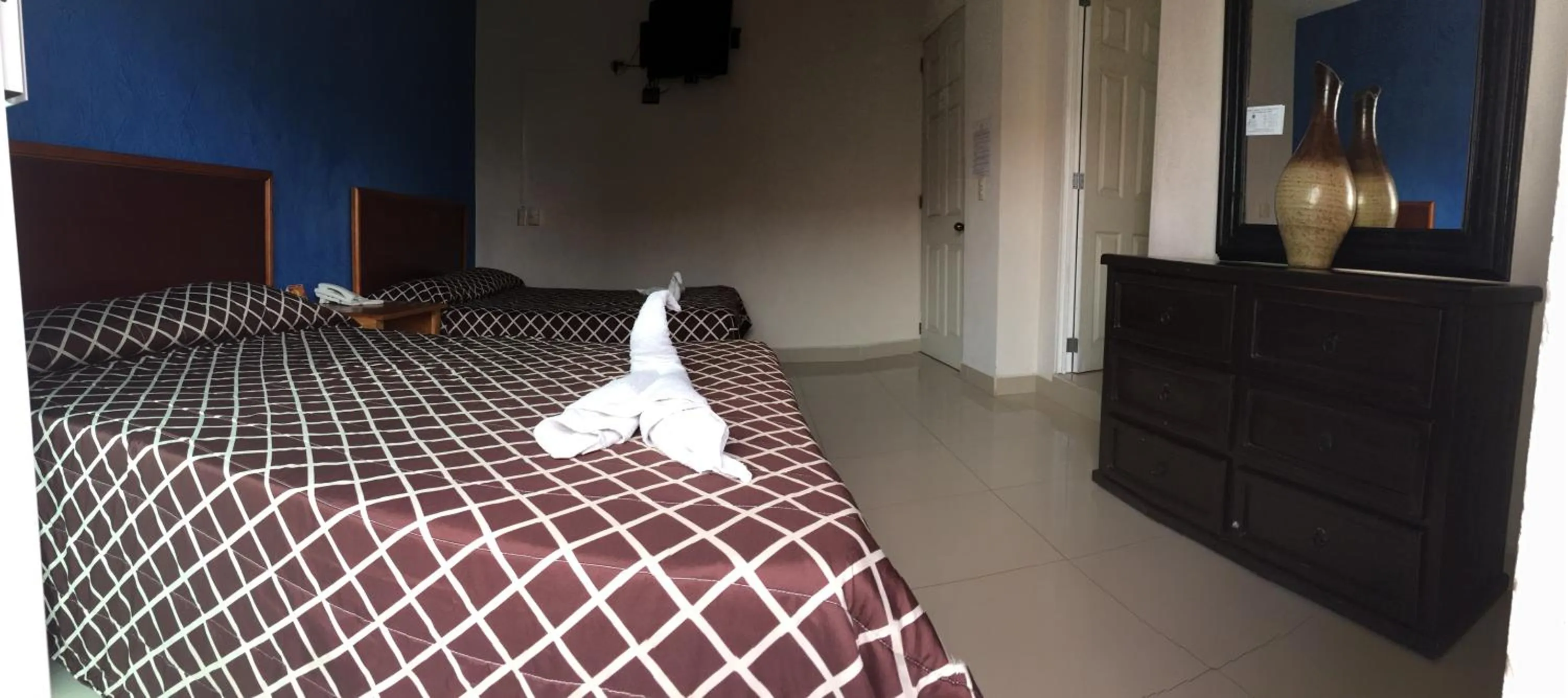 Bed in Casa del Parque Vallarta