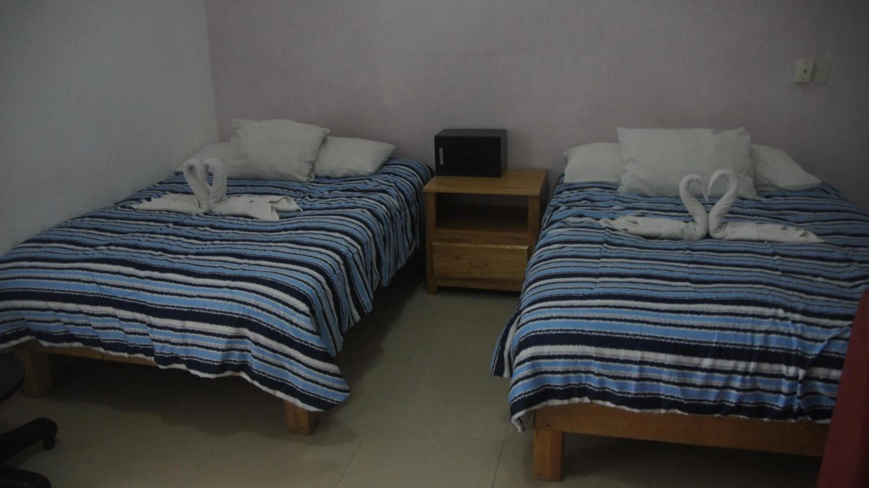 Bed in Casa del Parque Vallarta